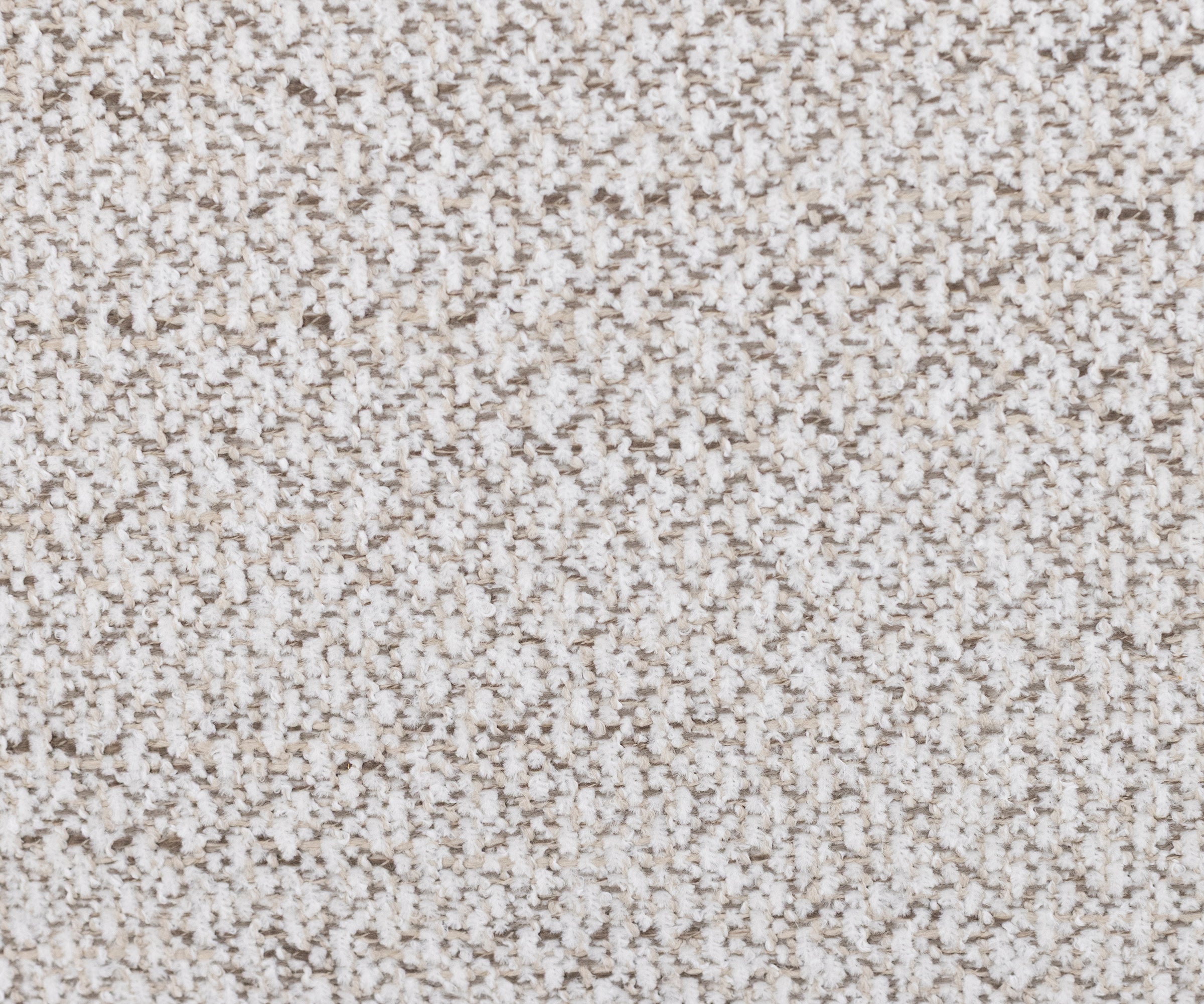 Close-up of textured beige and white carpet fabric.