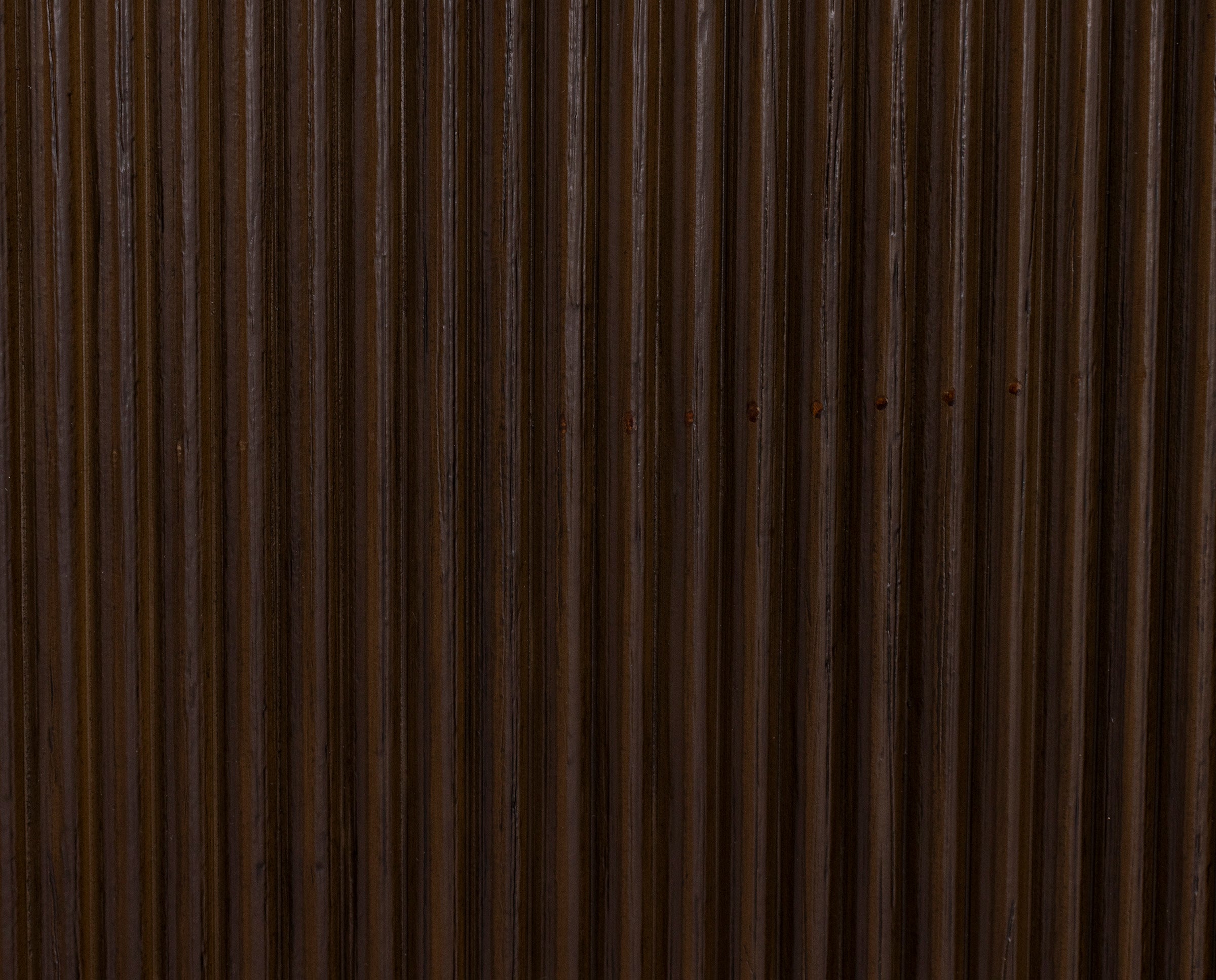 Dark brown vertical wood panel texture.
