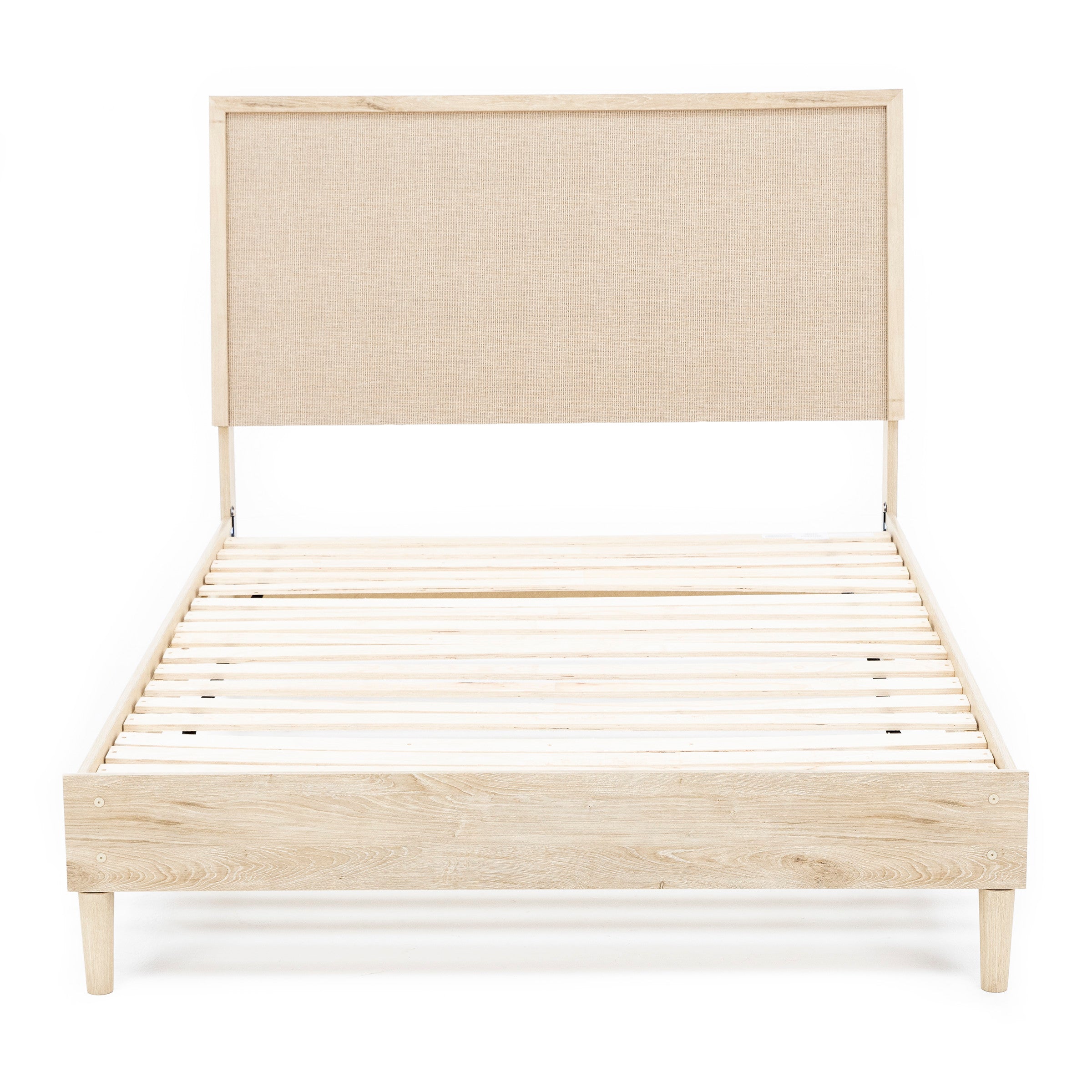 Light wood bed frame with fabric headboard, shown without mattress.