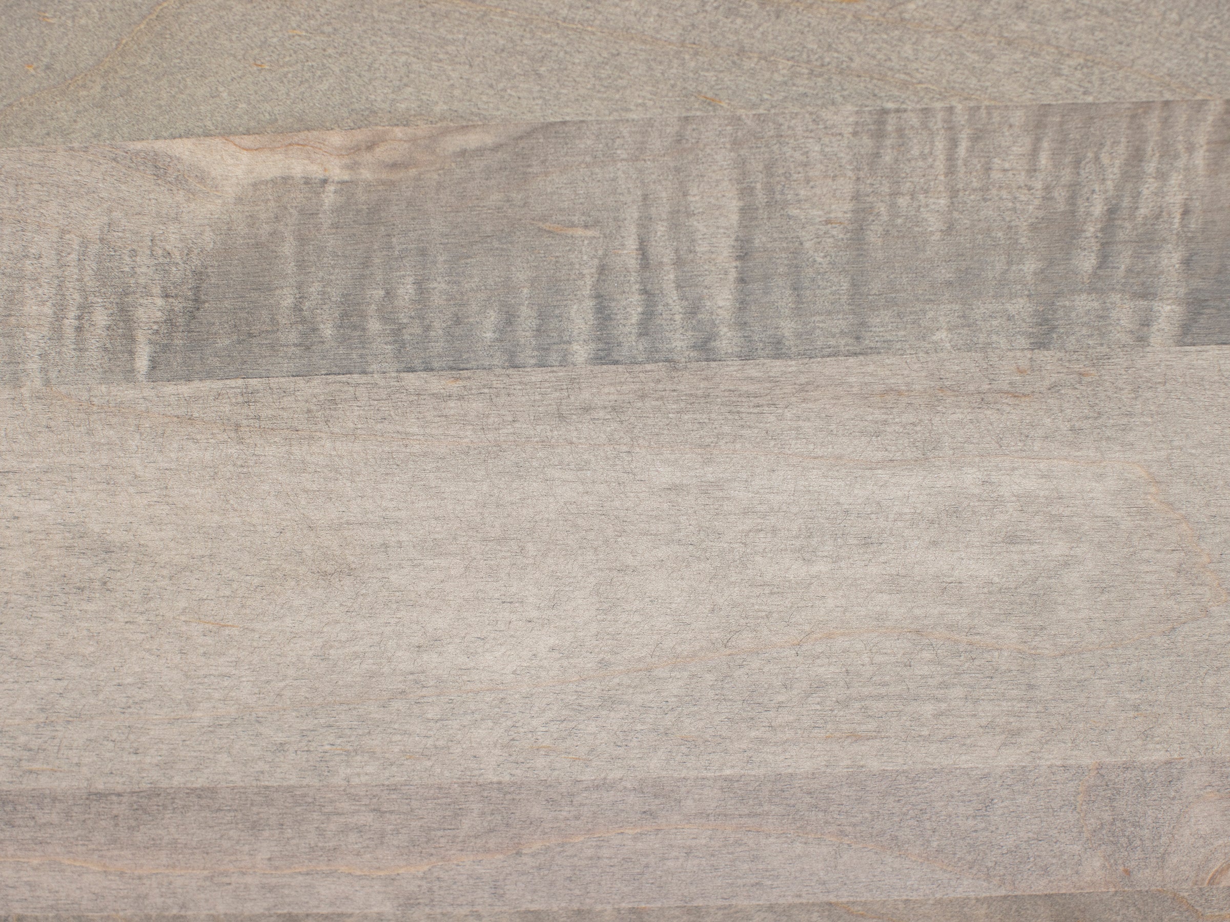 Light gray wood grain texture, suitable for furniture or flooring context.