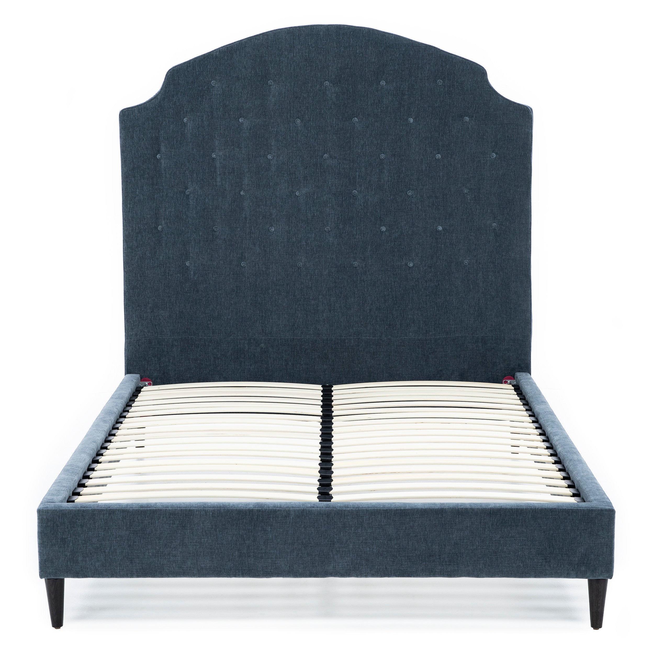 Upholstered bed frame with tall, curved headboard and slatted base.
