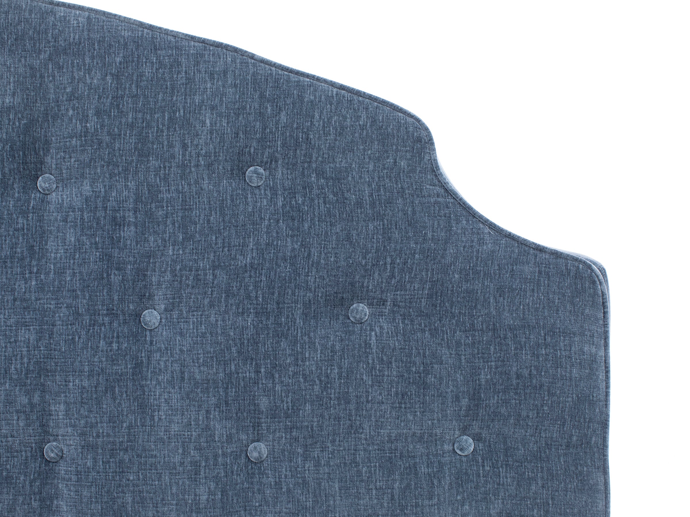 Blue upholstered headboard with button tufting, shown against a white background.