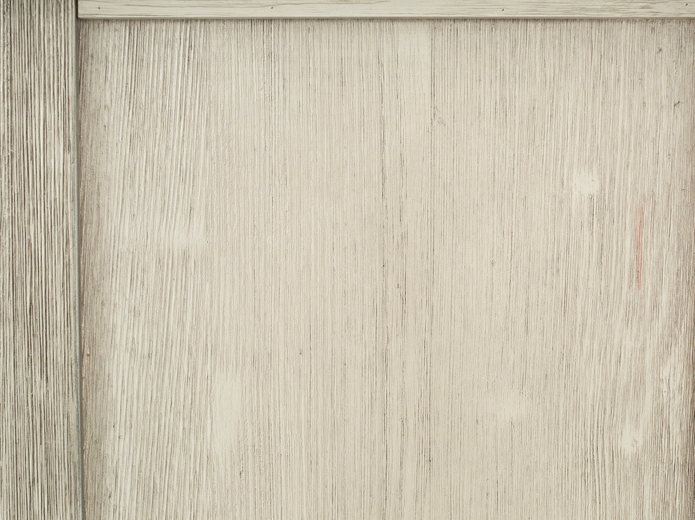 Light wood panel with vertical grain and a rustic, weathered finish.