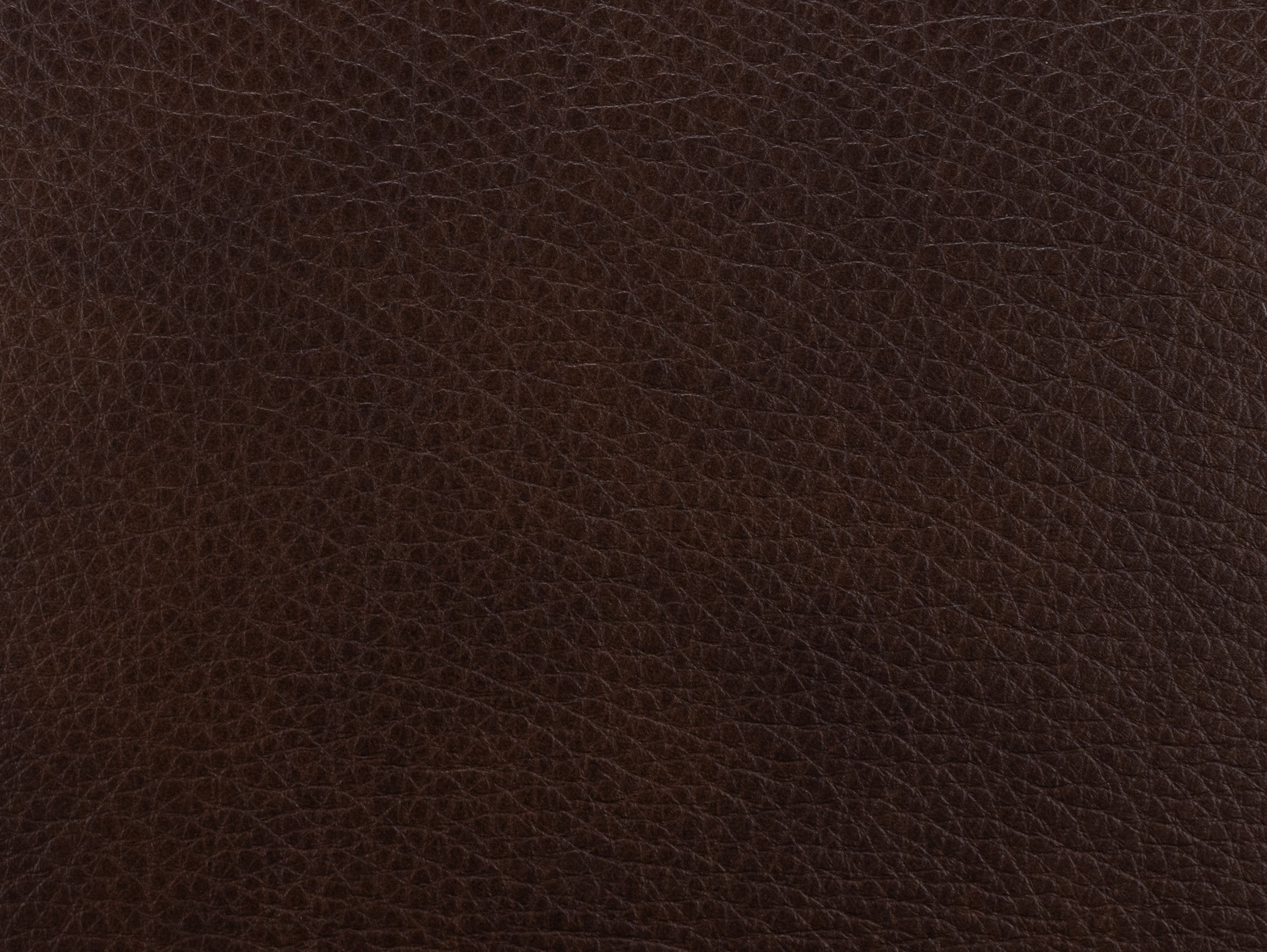 Dark brown pebbled leather texture.