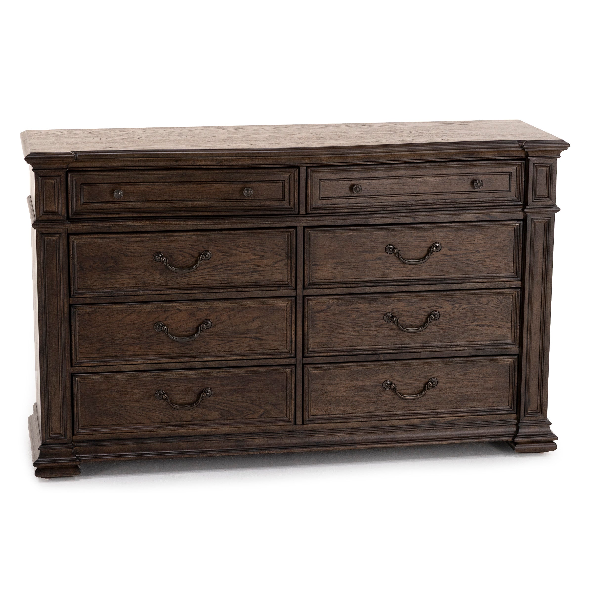 Dark wood dresser with eight drawers and classic metal handles.