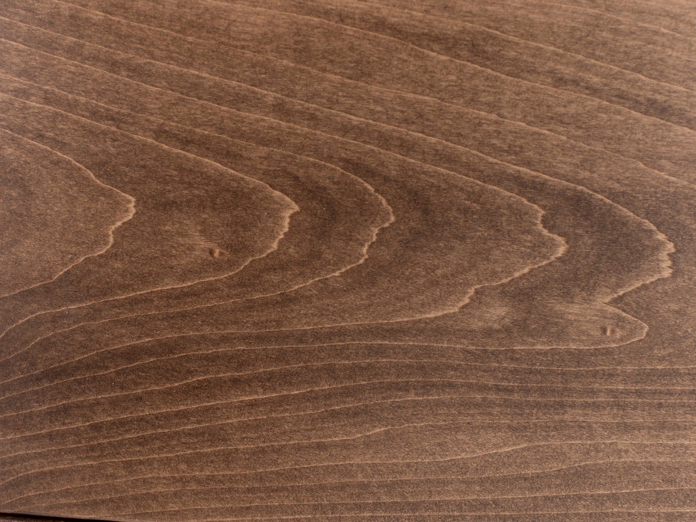 Close-up of brown wood grain pattern.