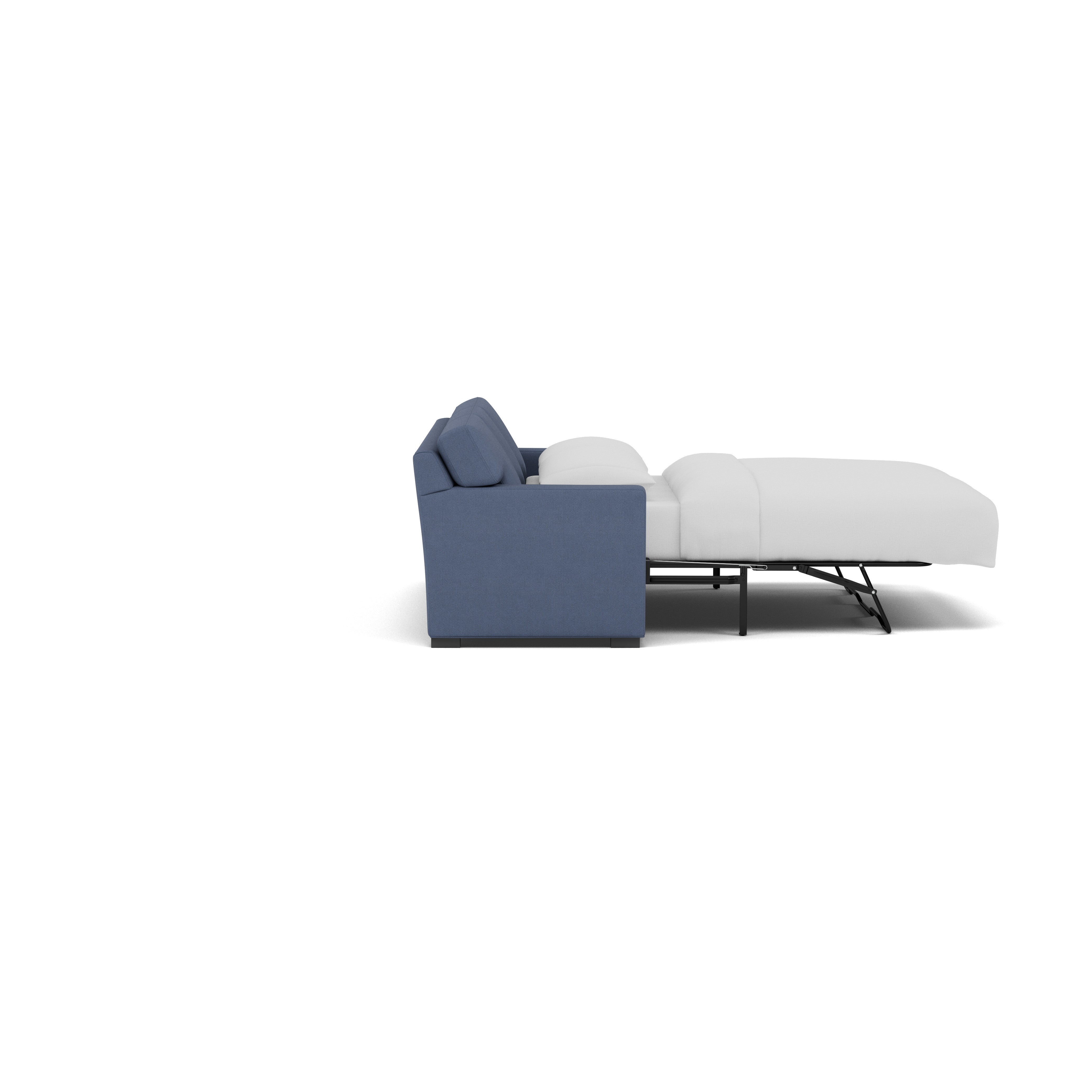 Side view of a blue sleeper sofa with pull-out bed extended and white bedding.
