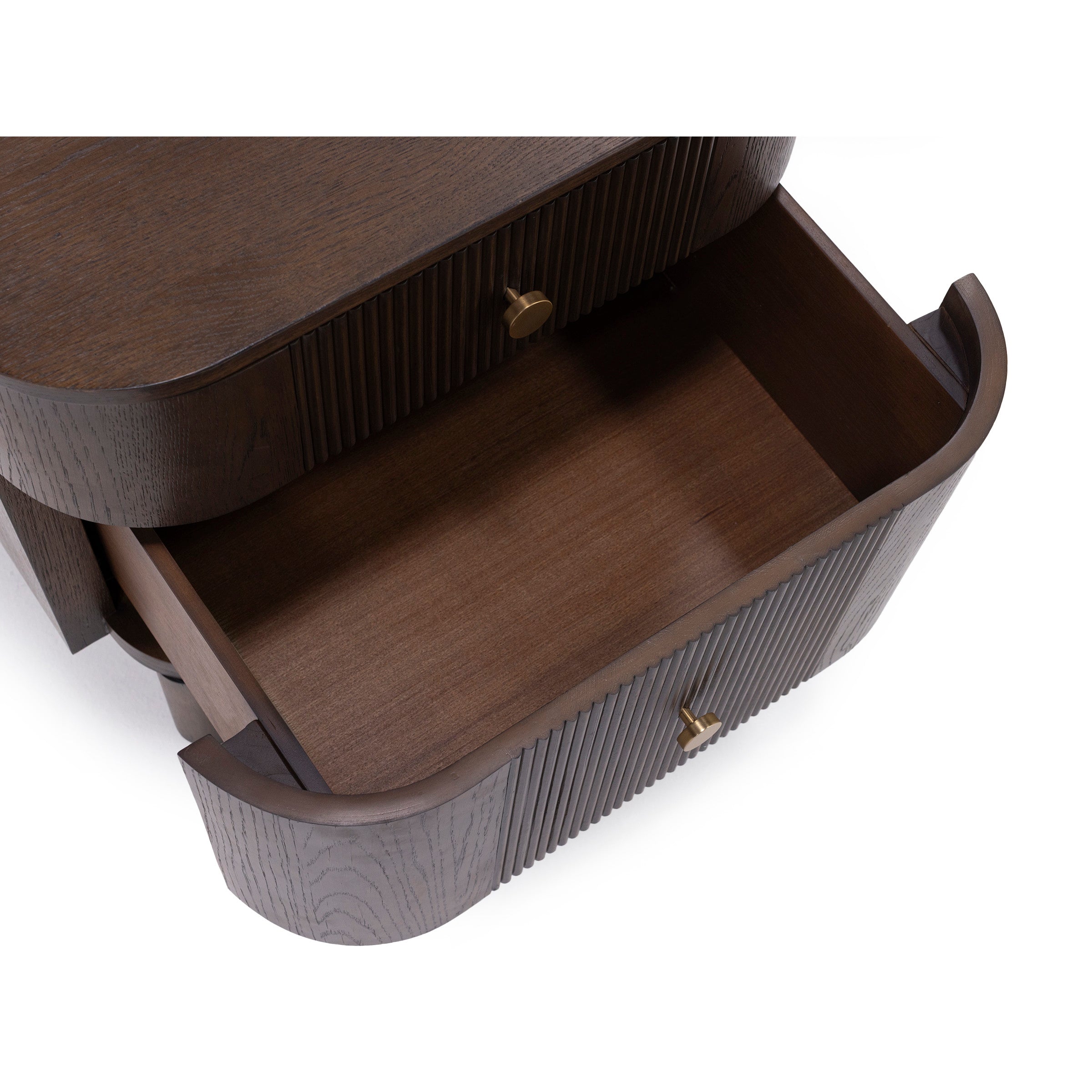 Open wooden drawer with brass knob, shown from above.