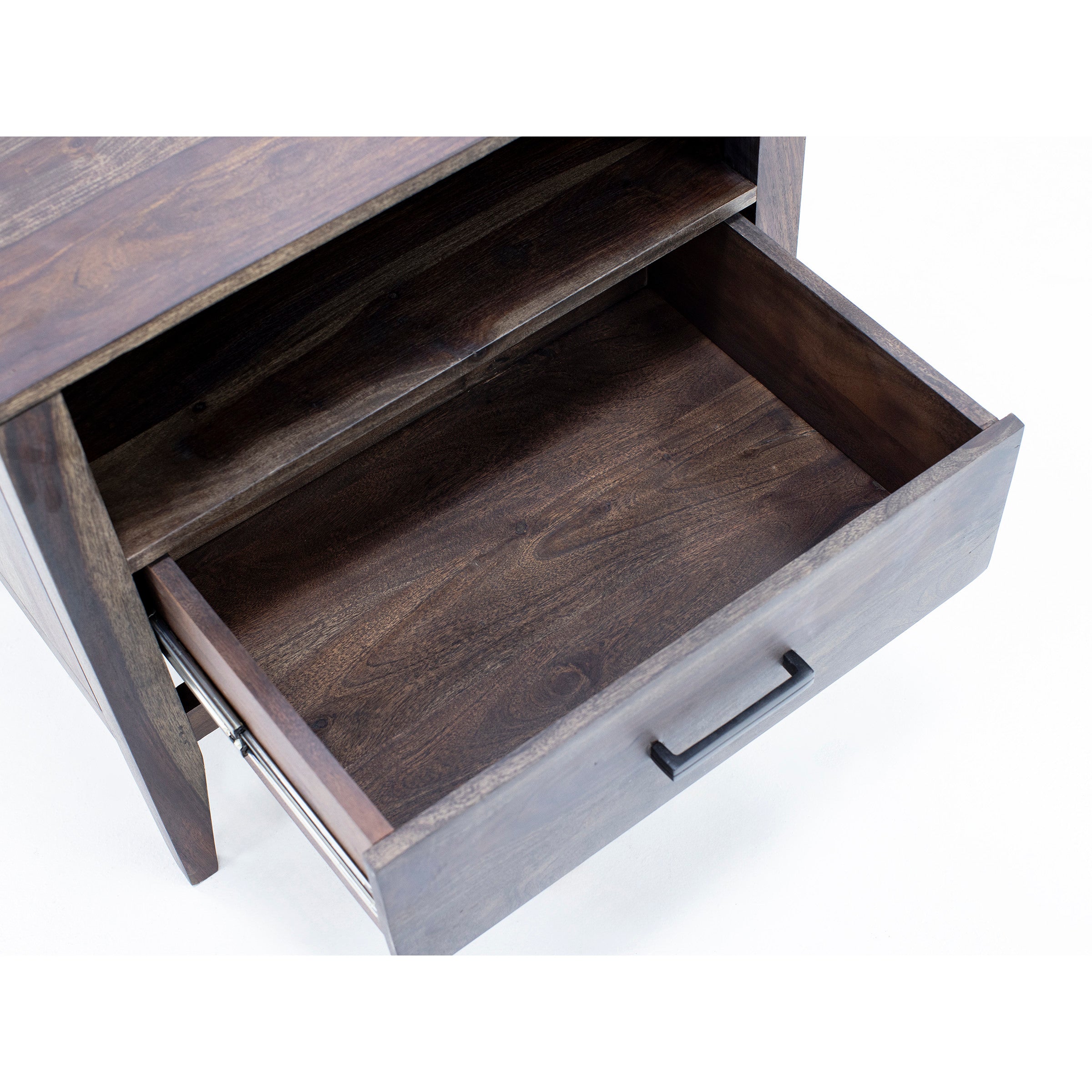 Open wooden drawer with metal handle, viewed from above.
