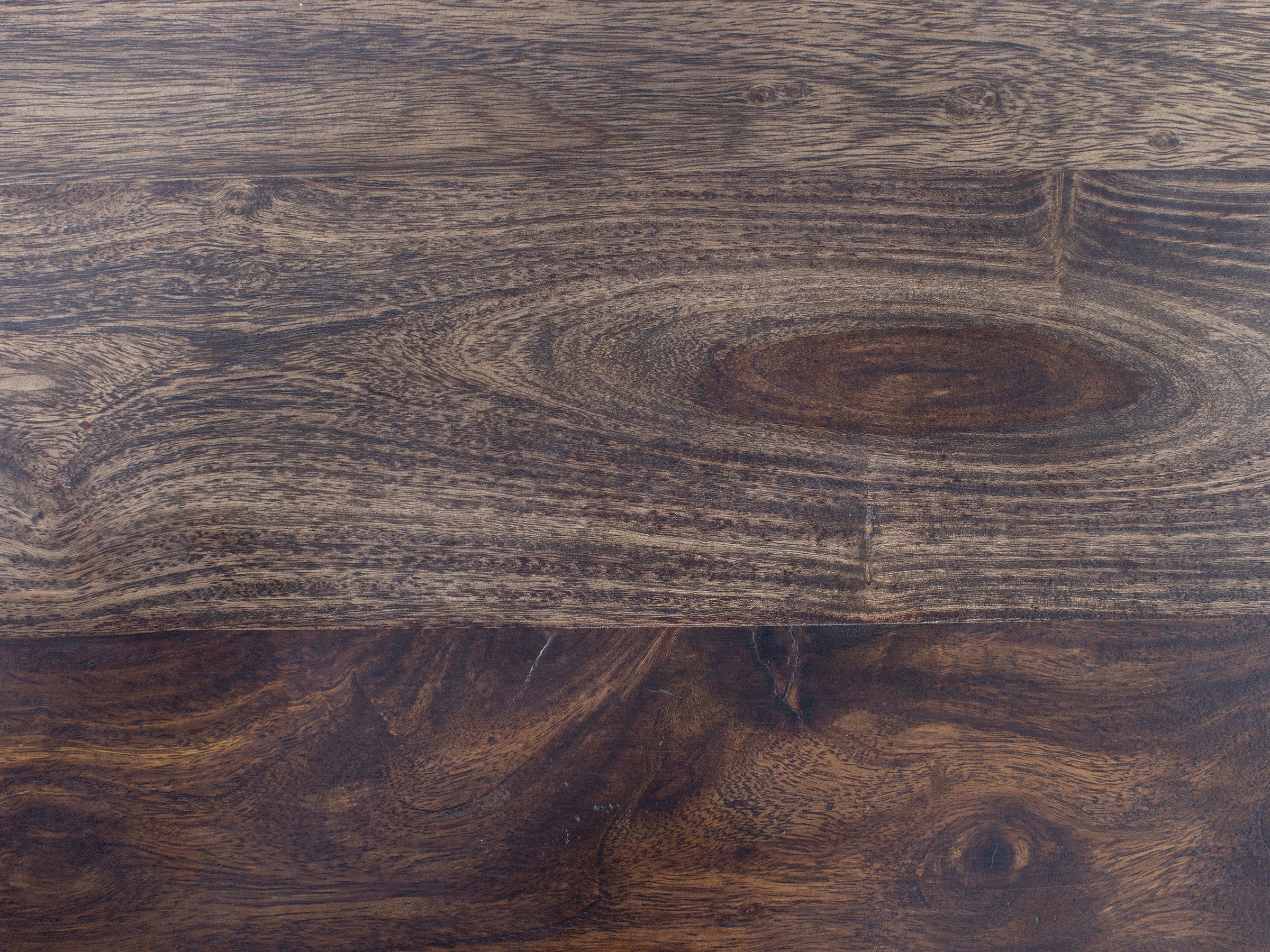Dark brown wood surface with visible natural grain patterns.