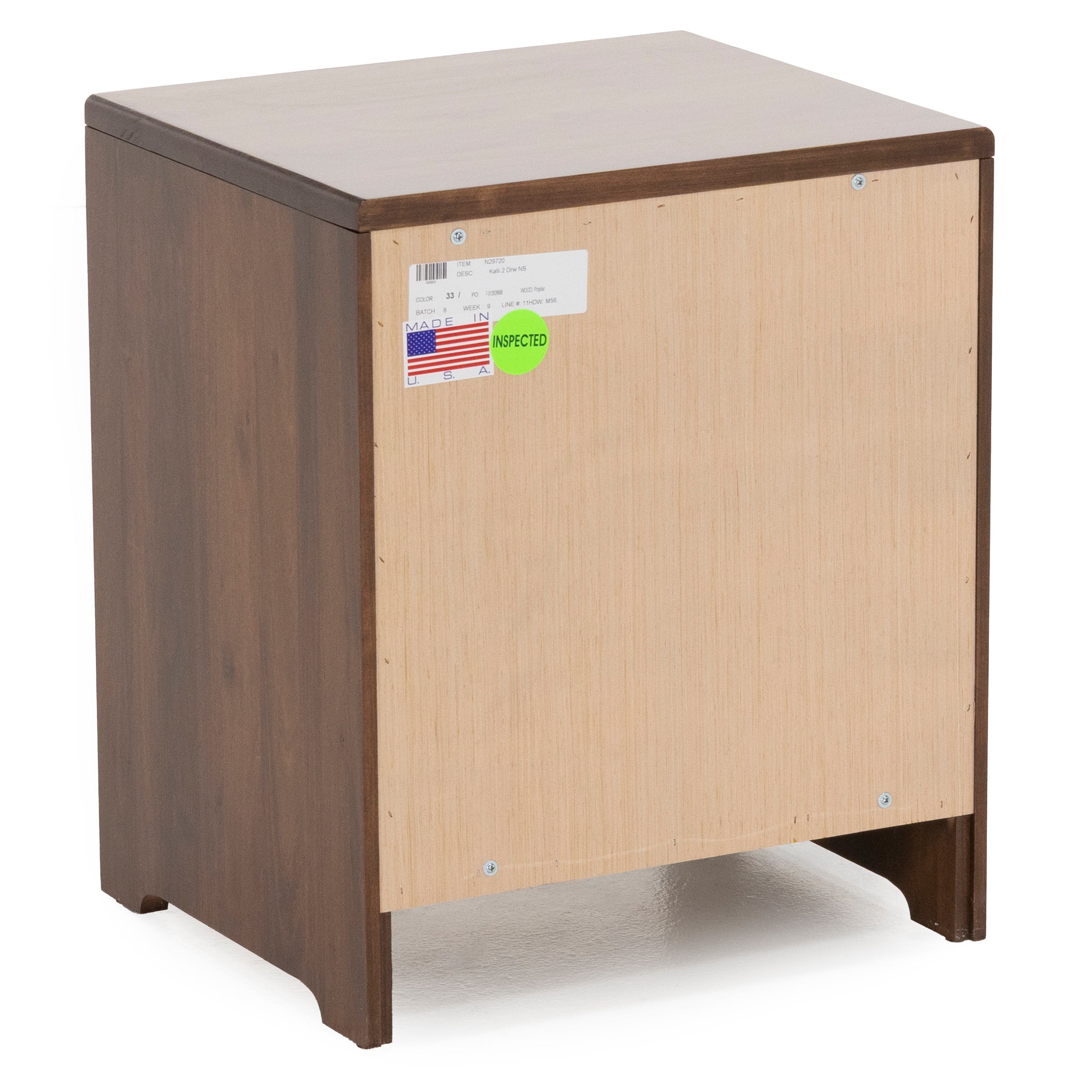 Back view of a small brown wooden cabinet showing inspection and manufacturing labels.