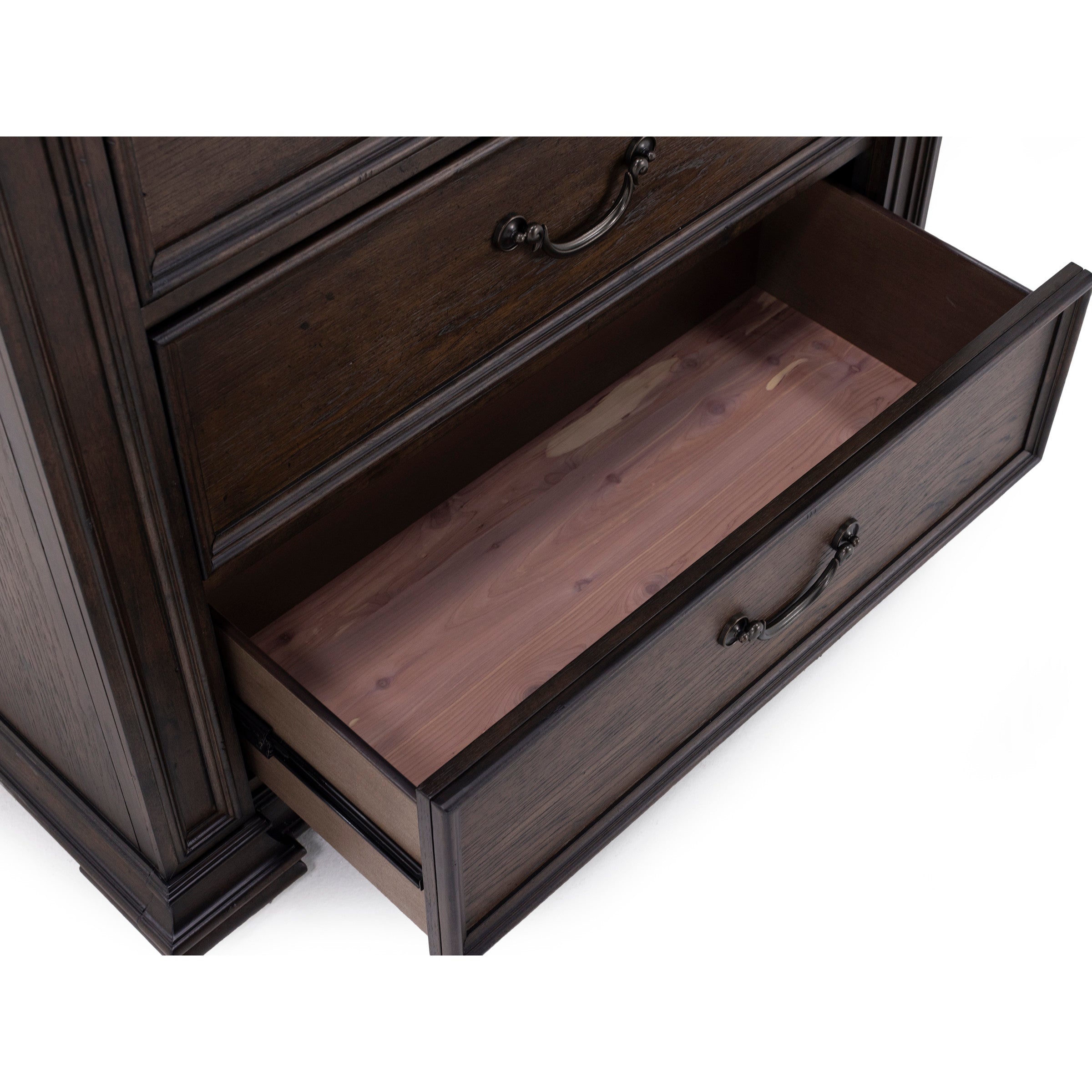 Open drawer revealing cedar-lined interior in a dark wood dresser.