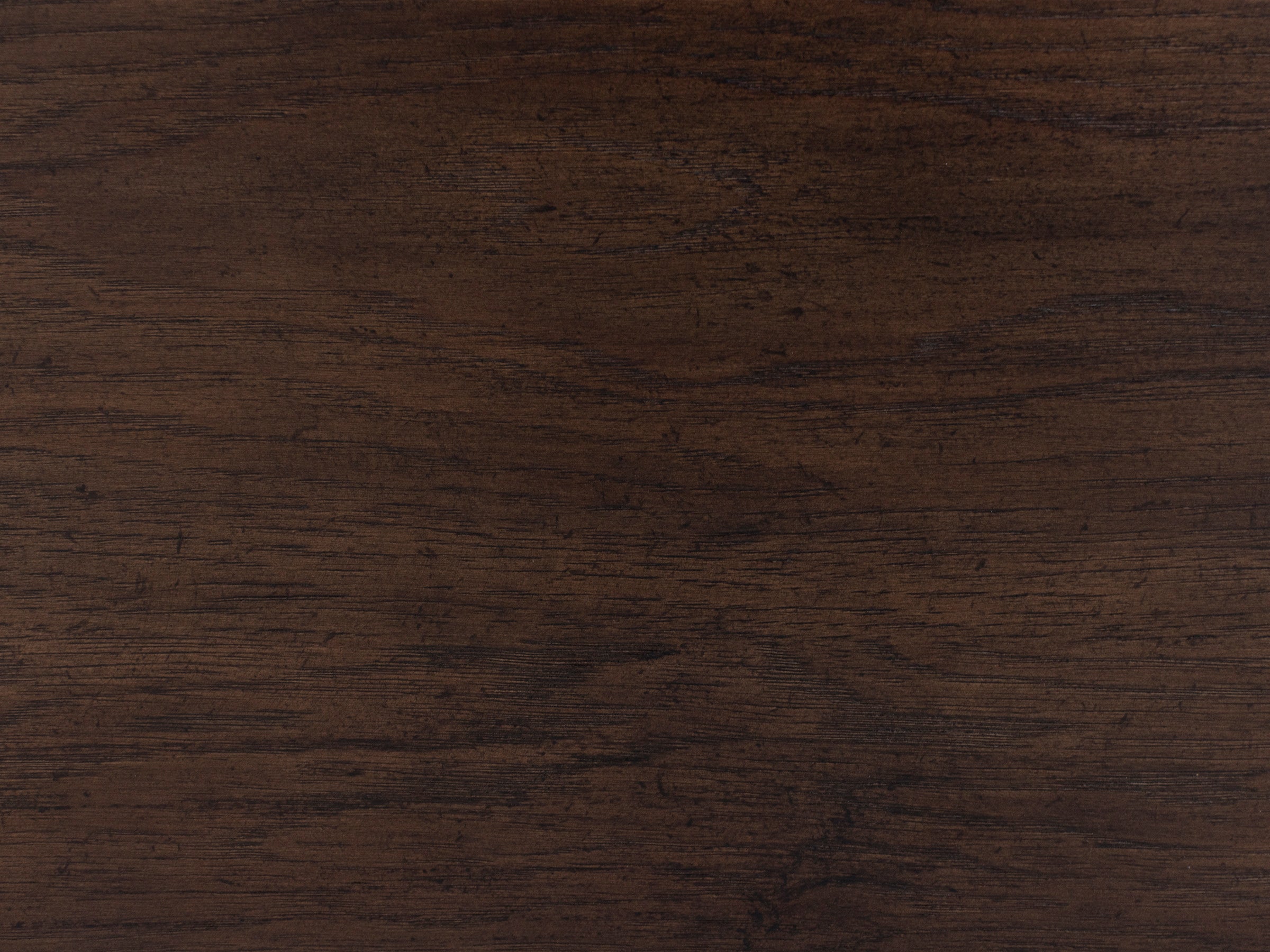 Dark wood grain texture, suitable as a background or surface sample.