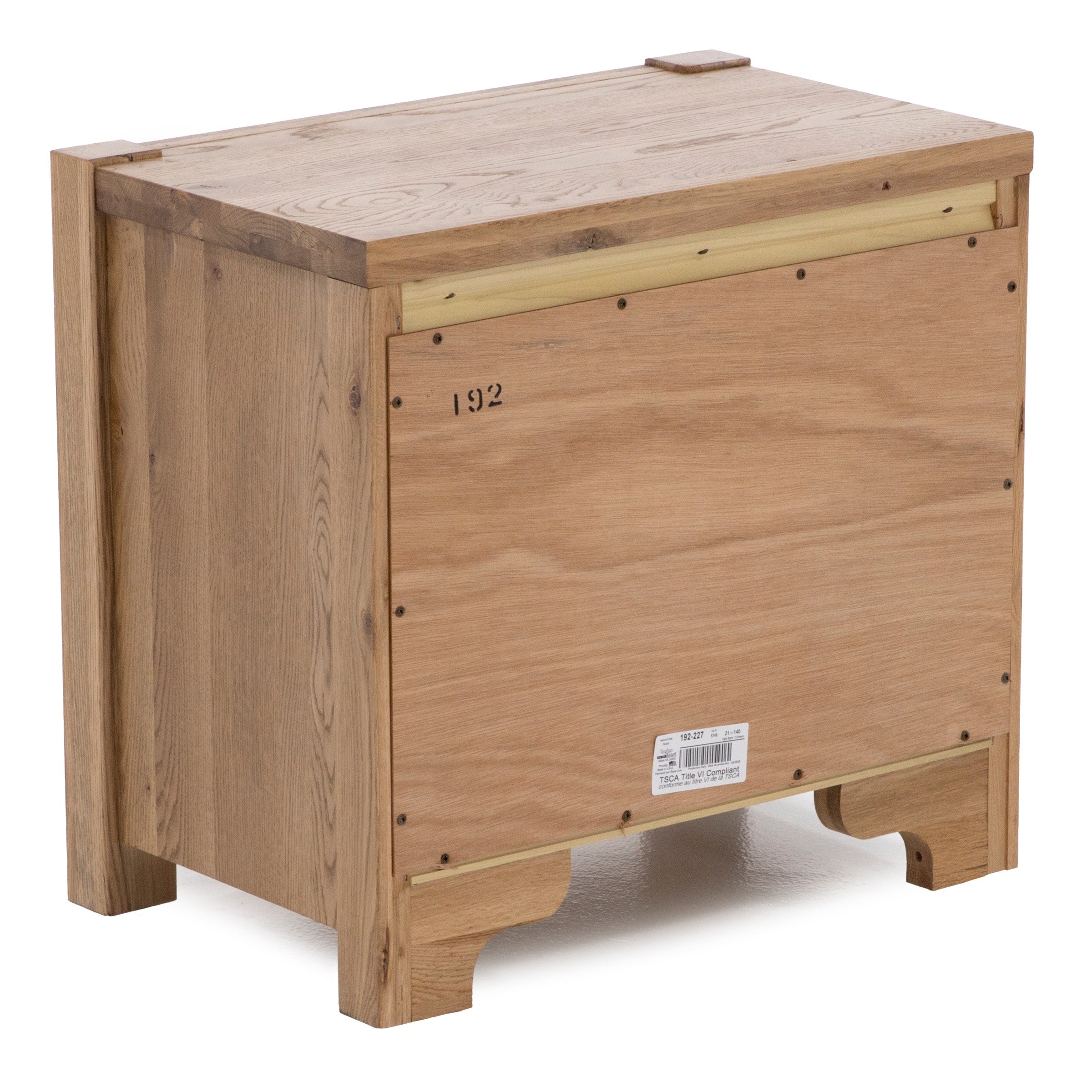 Back view of a wooden chest with visible wood grain and label, on a white background.