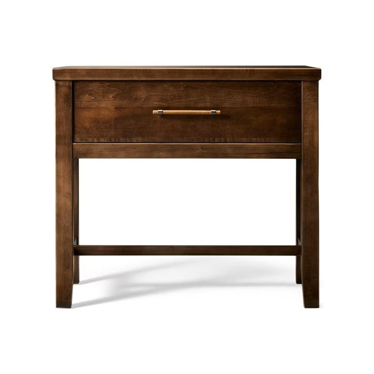 Dark wood nightstand with one drawer and gold handle.