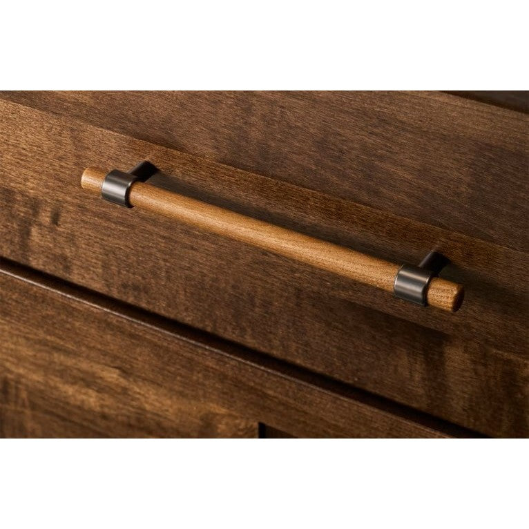 Wood drawer with metal handle in close-up view.