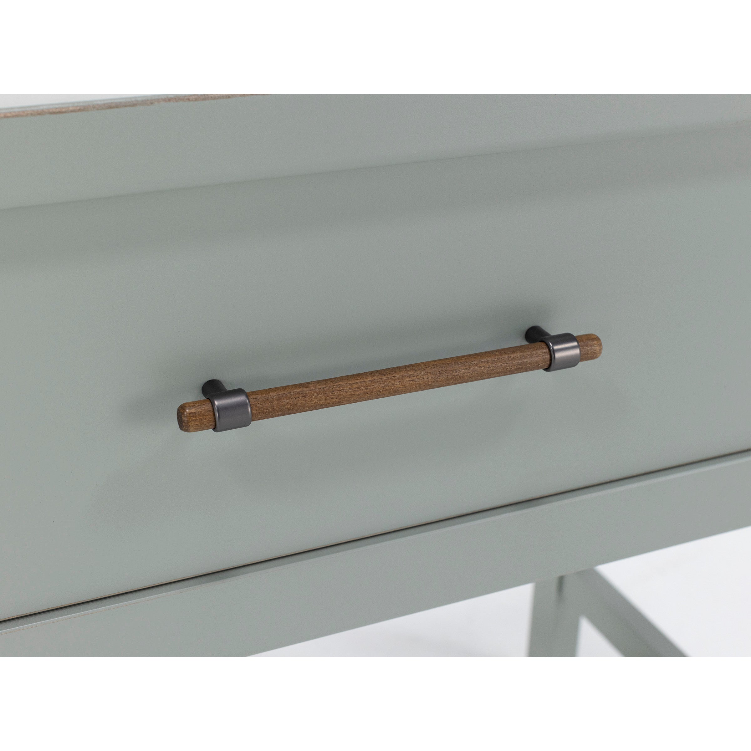Close-up of a drawer with a wooden and metal handle.