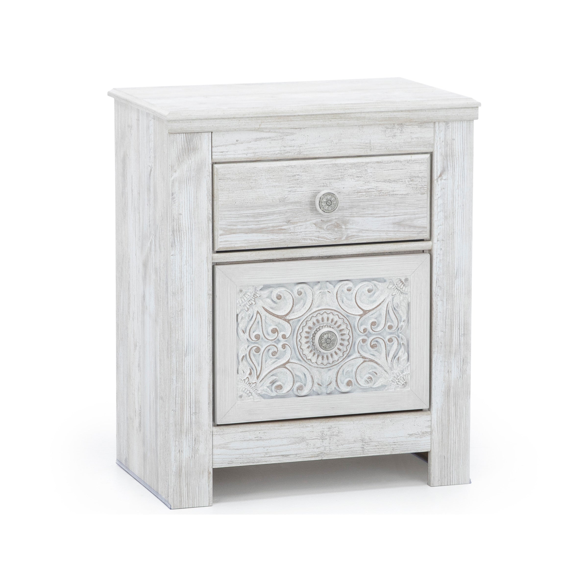 Light wood nightstand with one drawer and carved decorative panel.