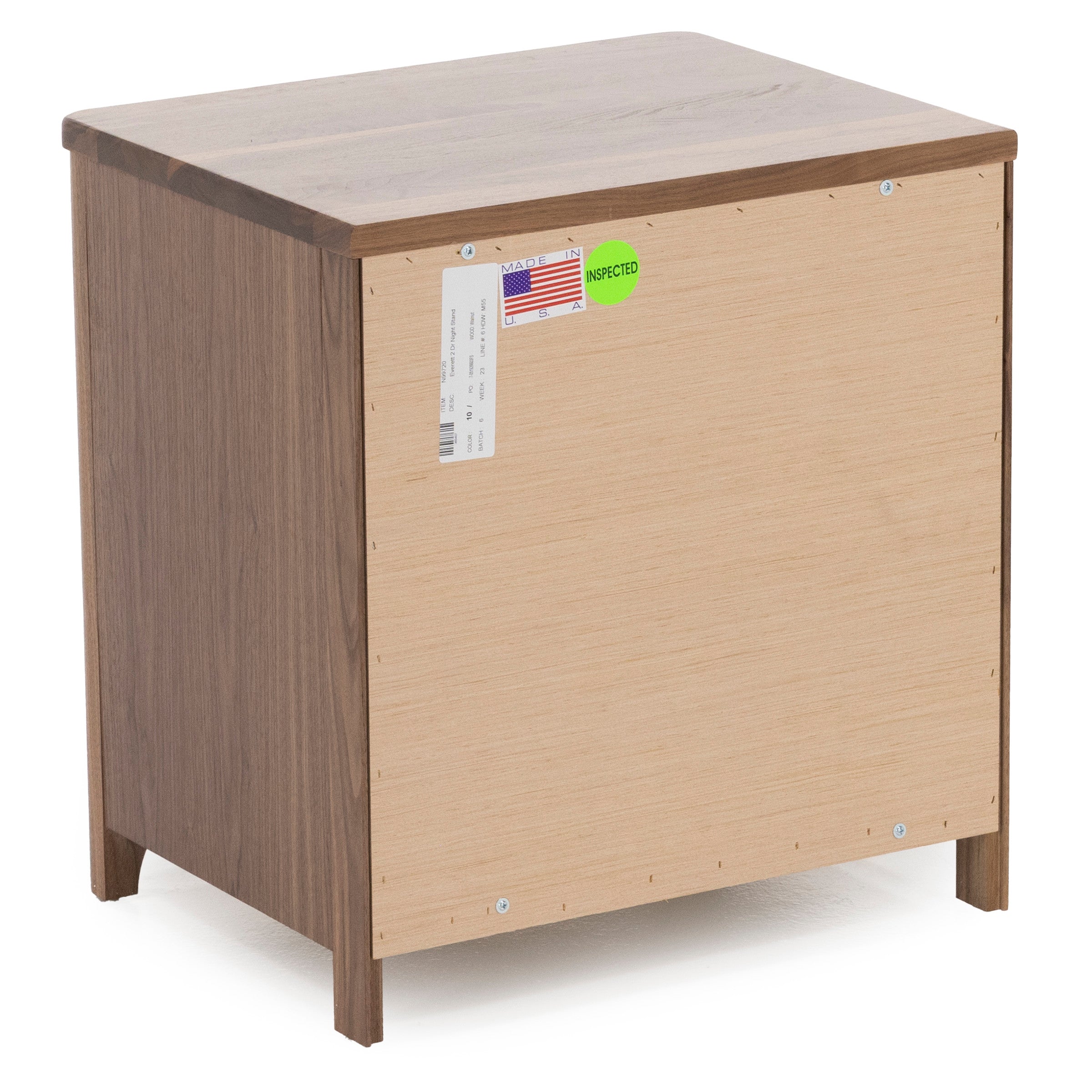 Back view of a wood cabinet with inspection and origin labels