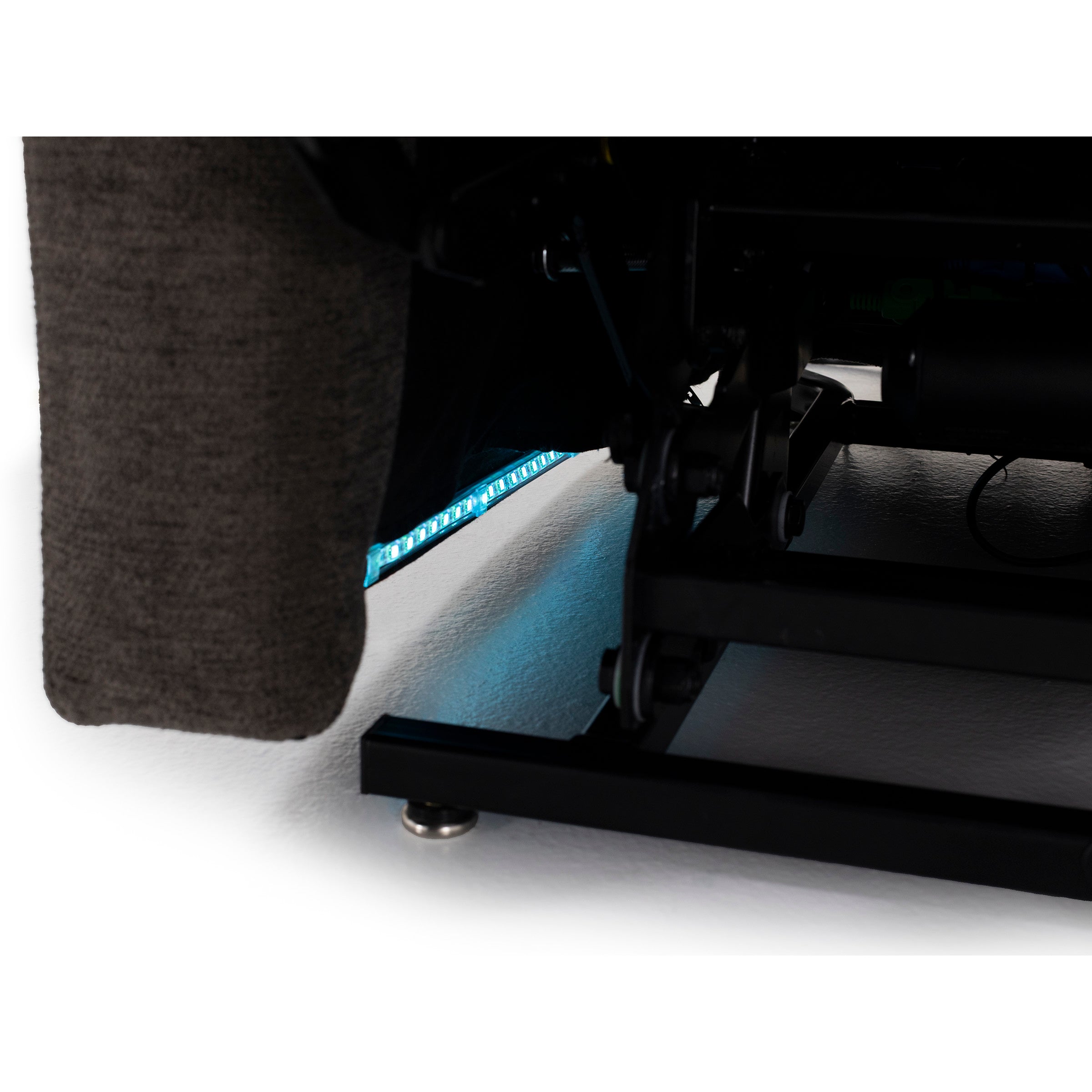 Close-up of recliner base with blue LED lighting underneath.