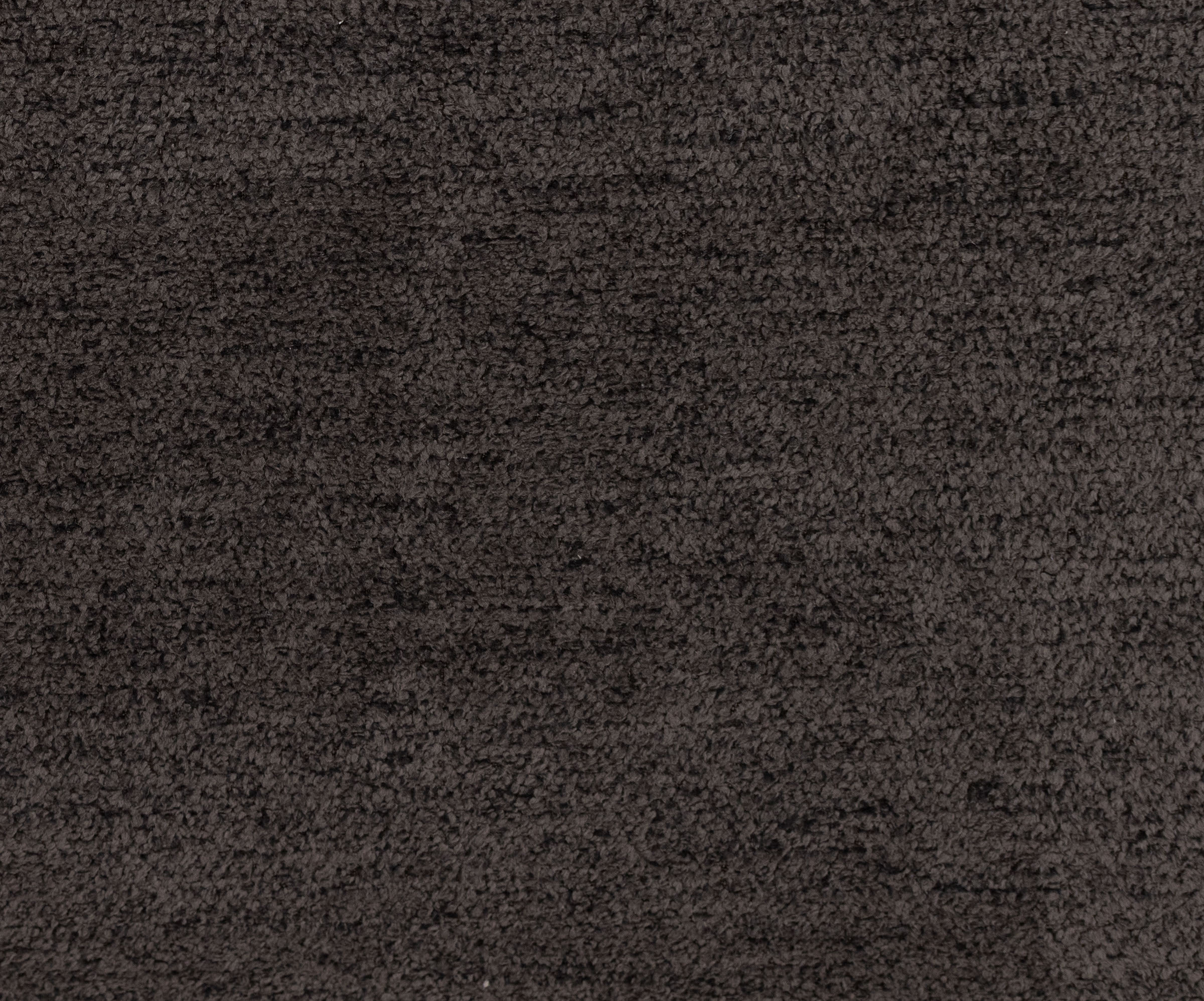 Close-up of dark brown textured carpet surface.