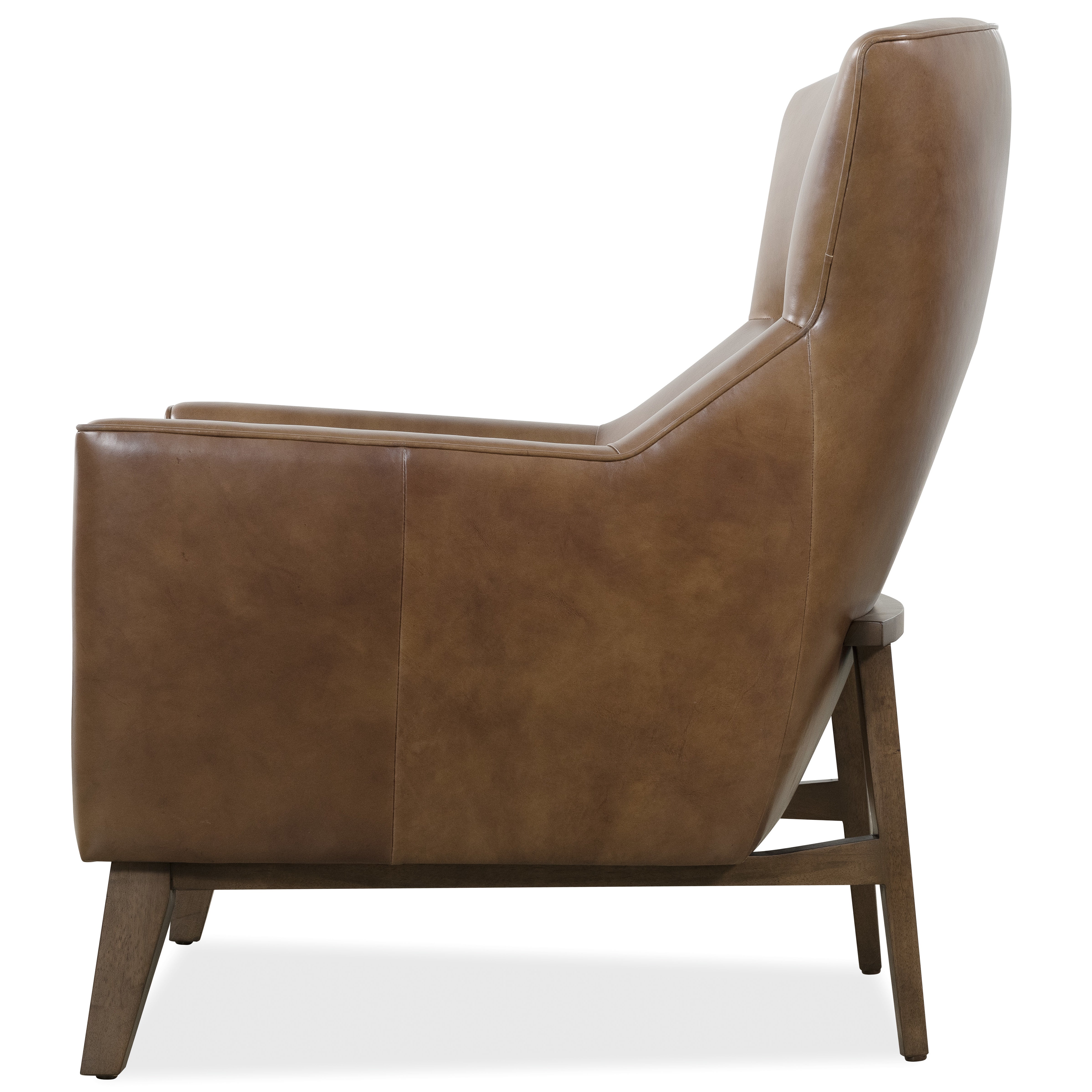 Side view of a modern brown leather armchair with angled wood legs