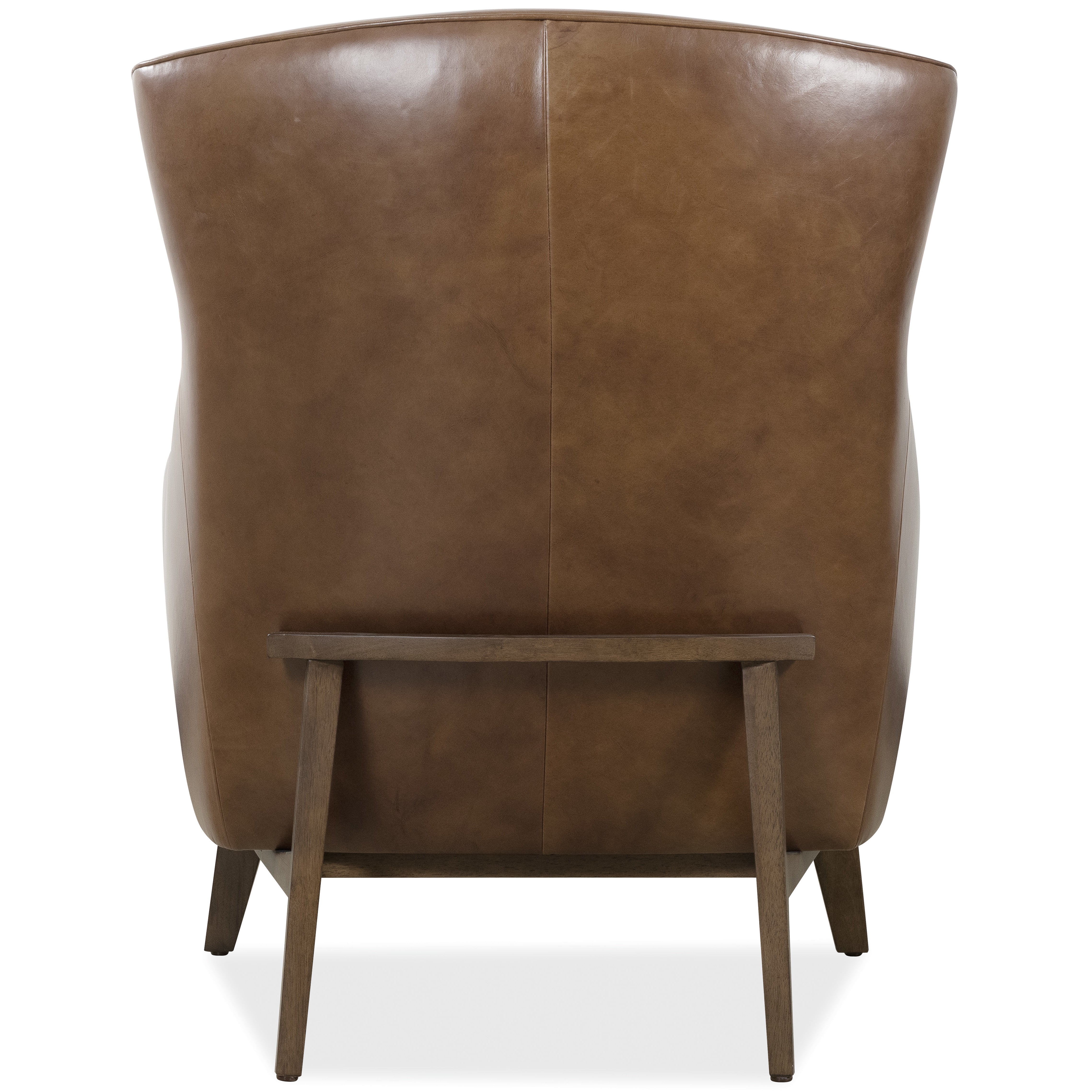 Back view of a brown leather armchair with wooden legs and support bar.