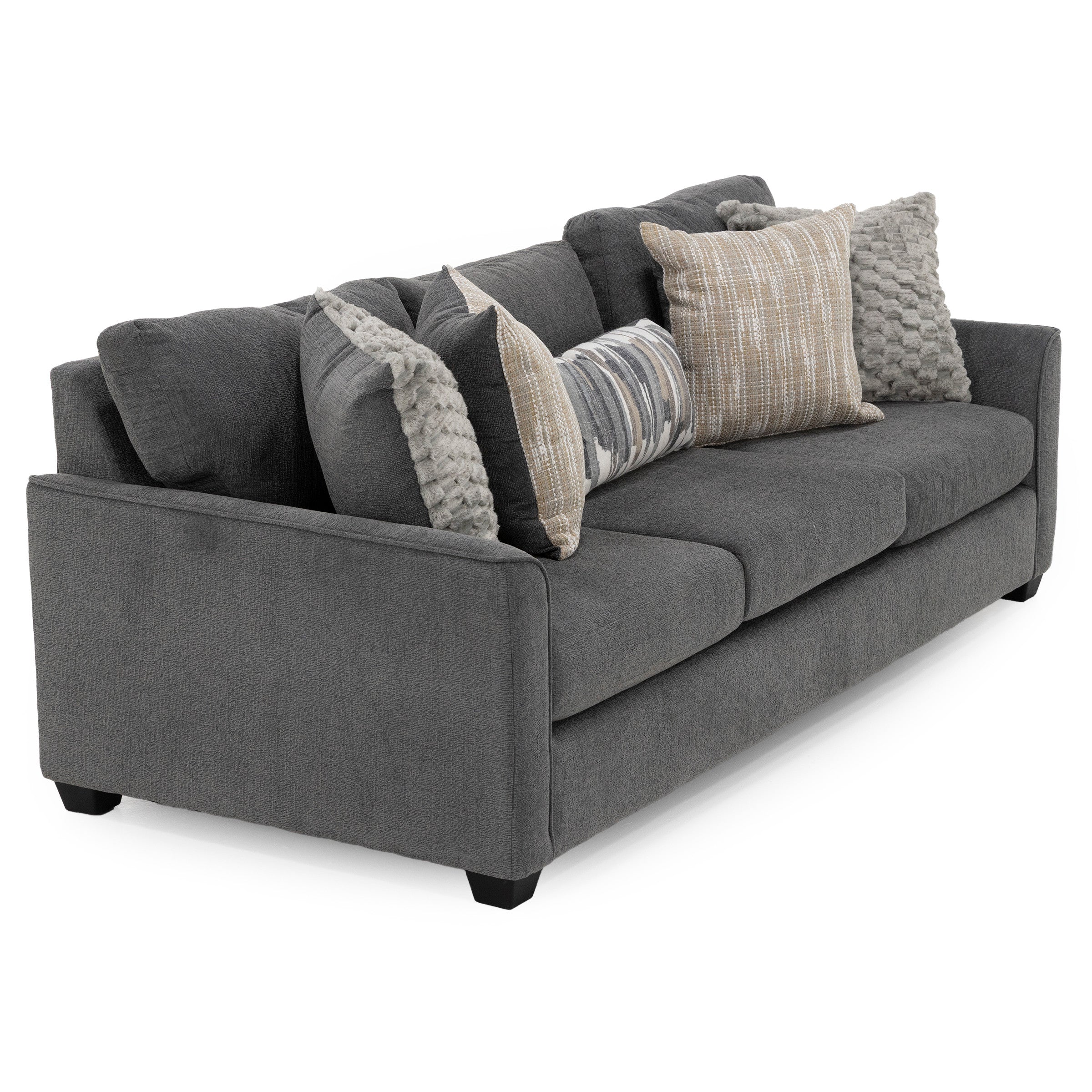 Dark gray sofa with multiple decorative pillows in neutral tones.