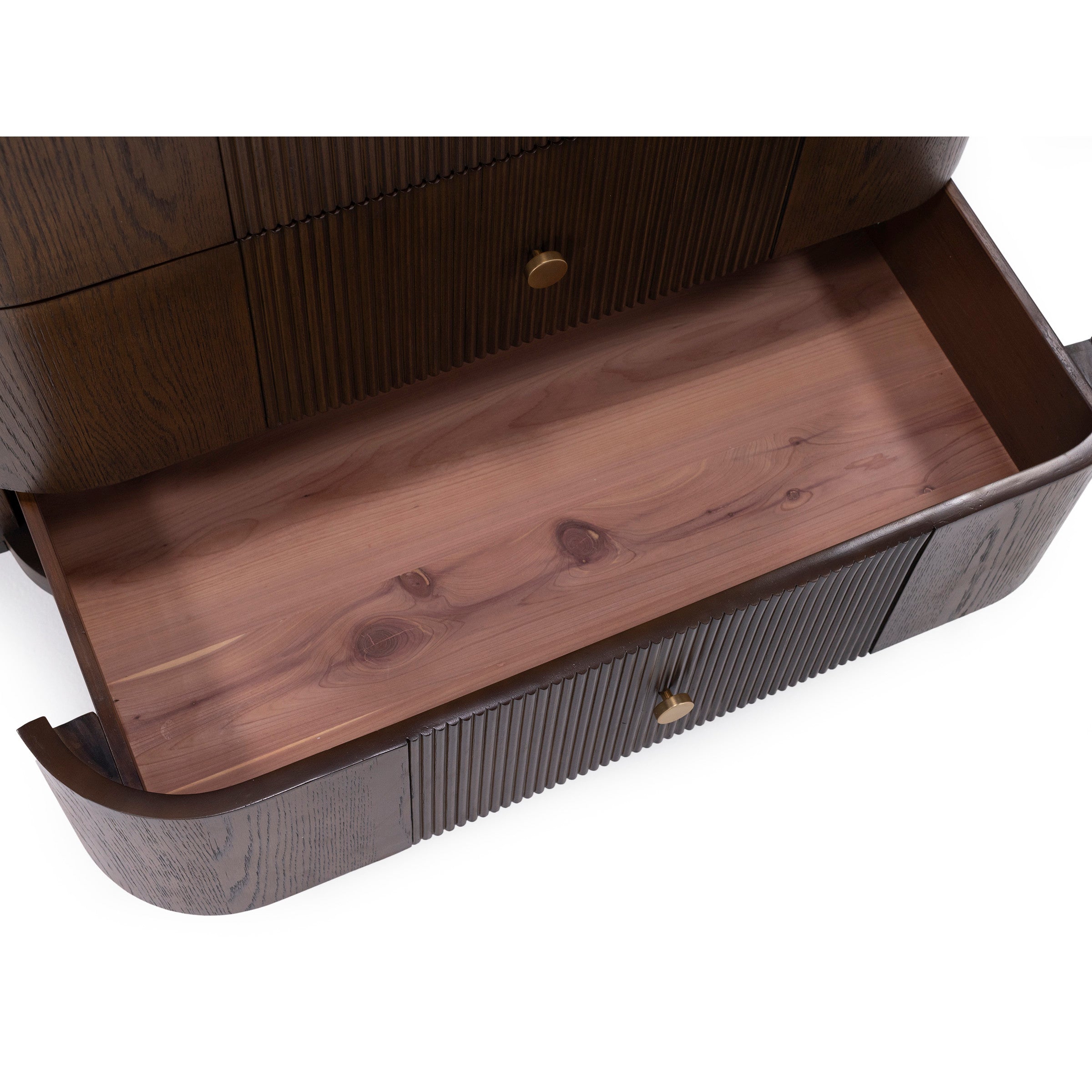 Open wooden drawer with brass knob, showing cedar-lined interior.