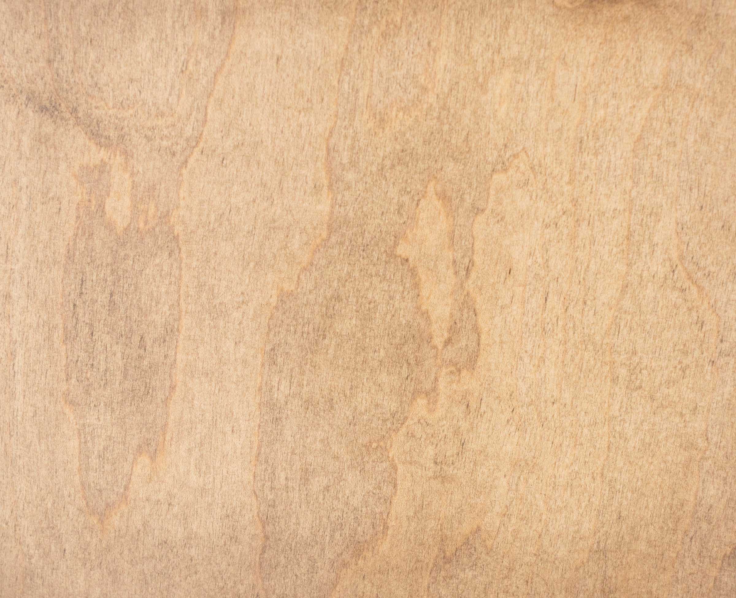 Light wood texture with visible grain pattern, suitable as a neutral background.