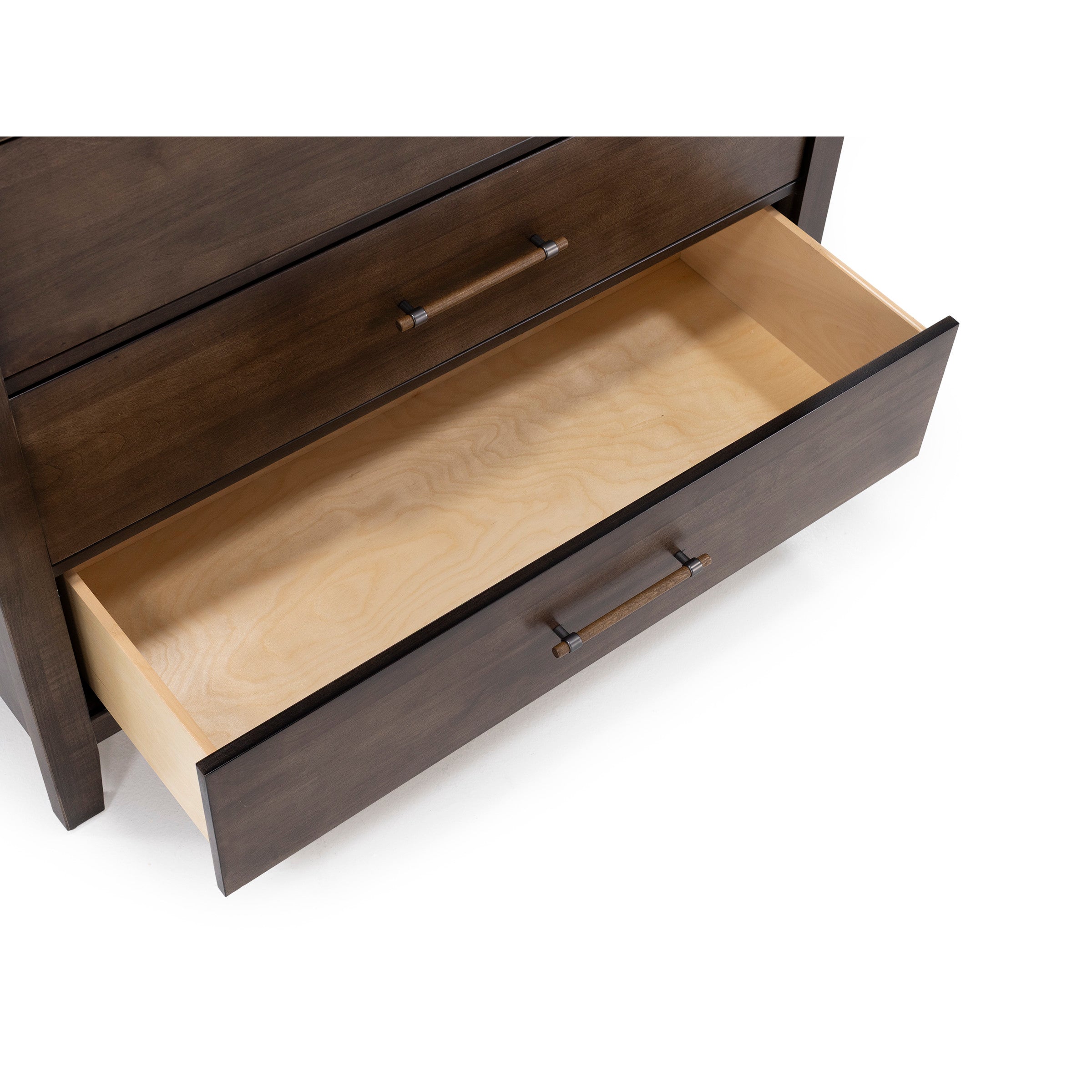 Open dresser drawer showing empty interior with wood finish.