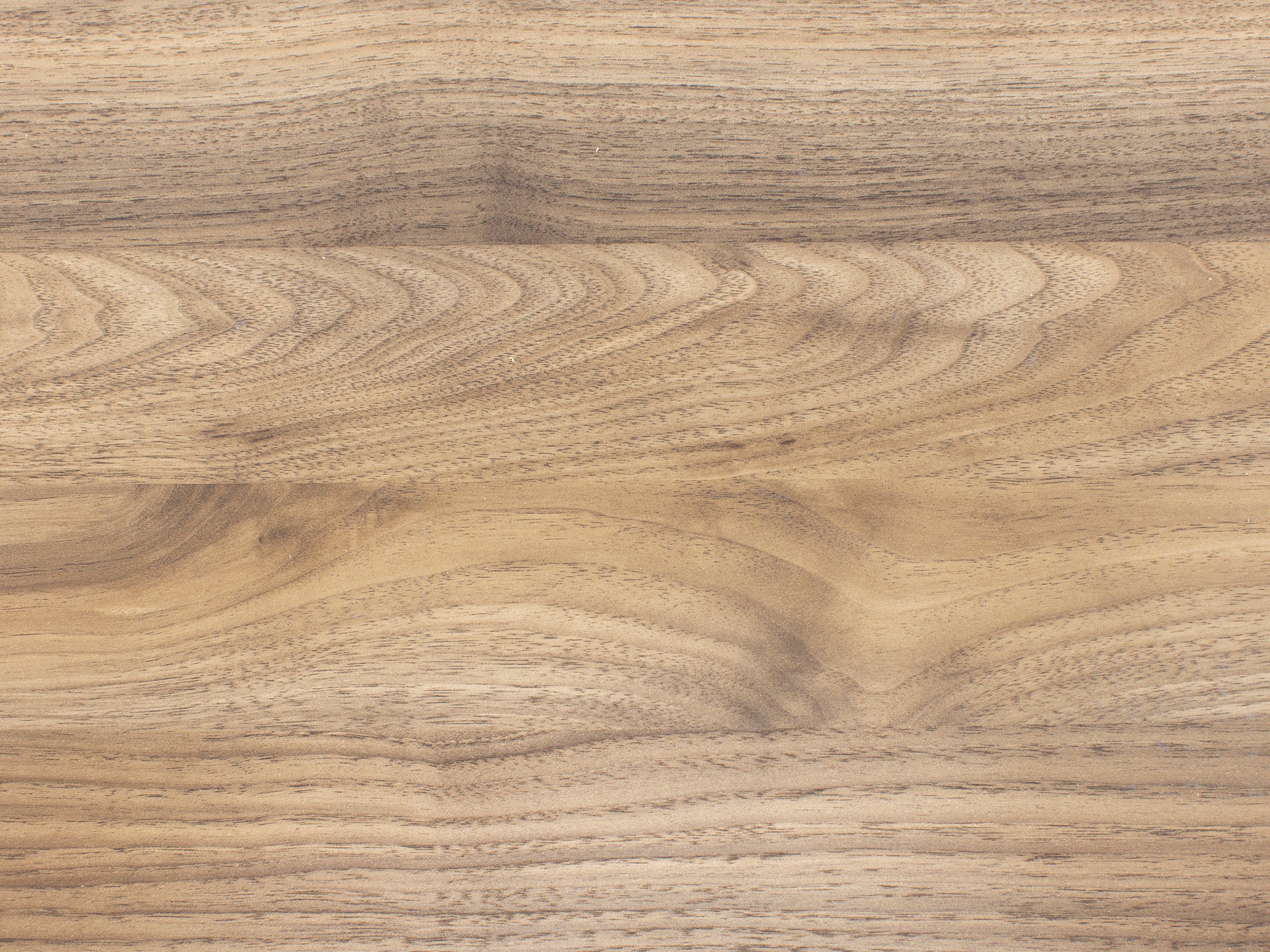 Light brown wood texture with natural grain patterns.