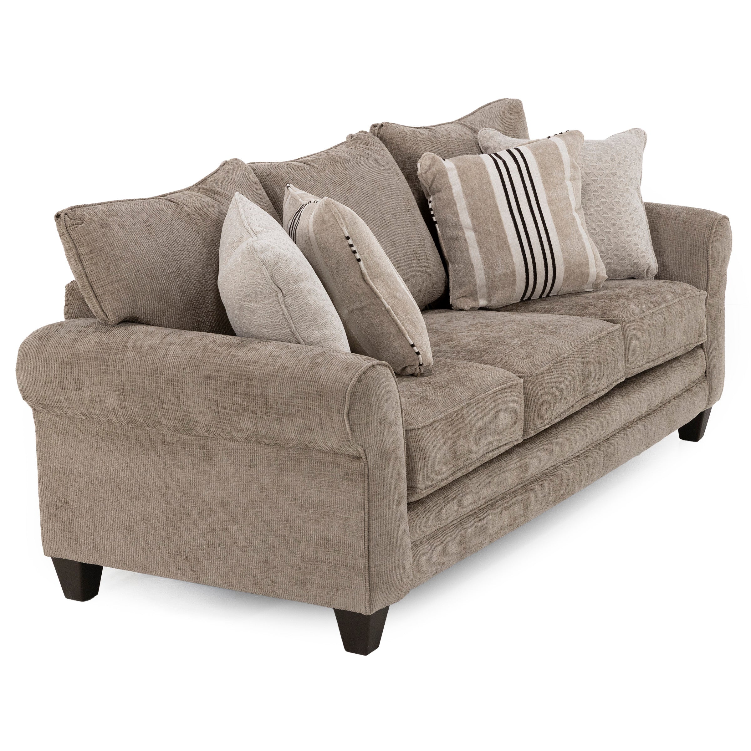 Beige fabric sofa with rolled arms and multiple decorative pillows.
