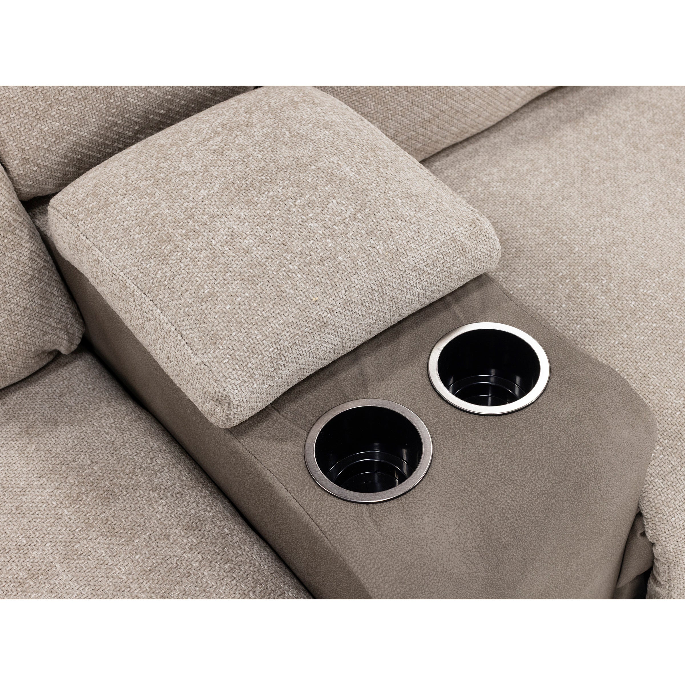 Light brown fabric couch armrest with two built-in cup holders.