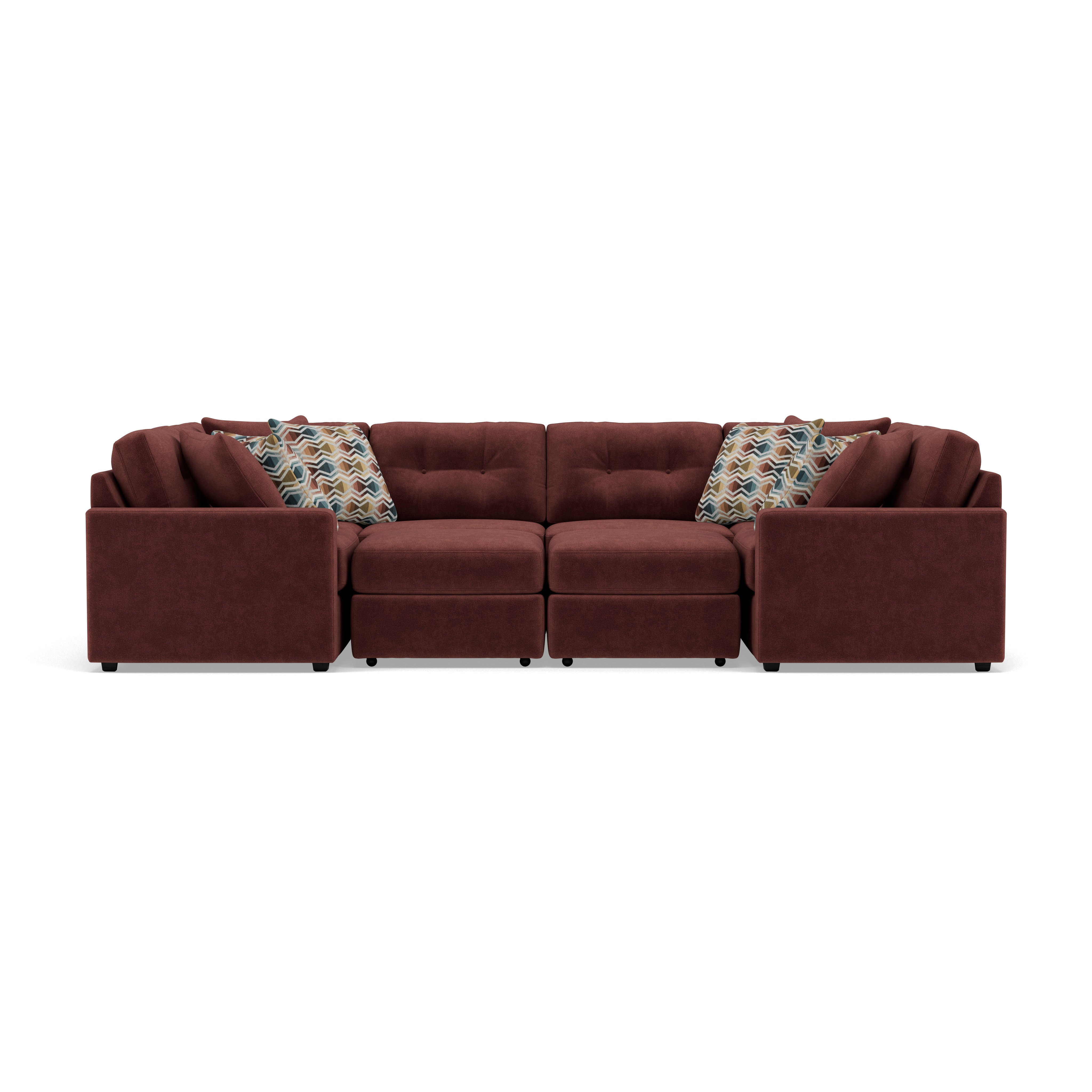Modular brown sectional sofa with patterned accent pillows, shown from the front.