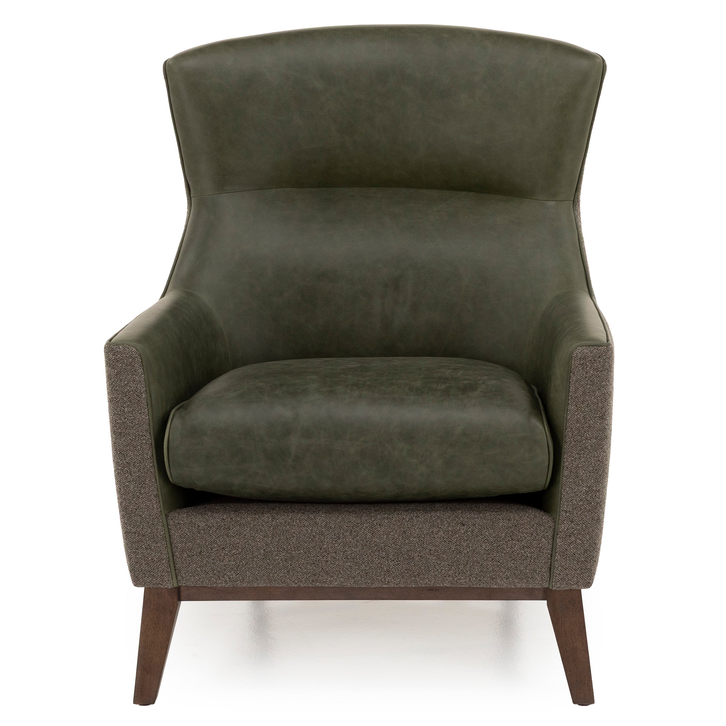 Modern armchair with green leather cushion, fabric sides, and wooden legs