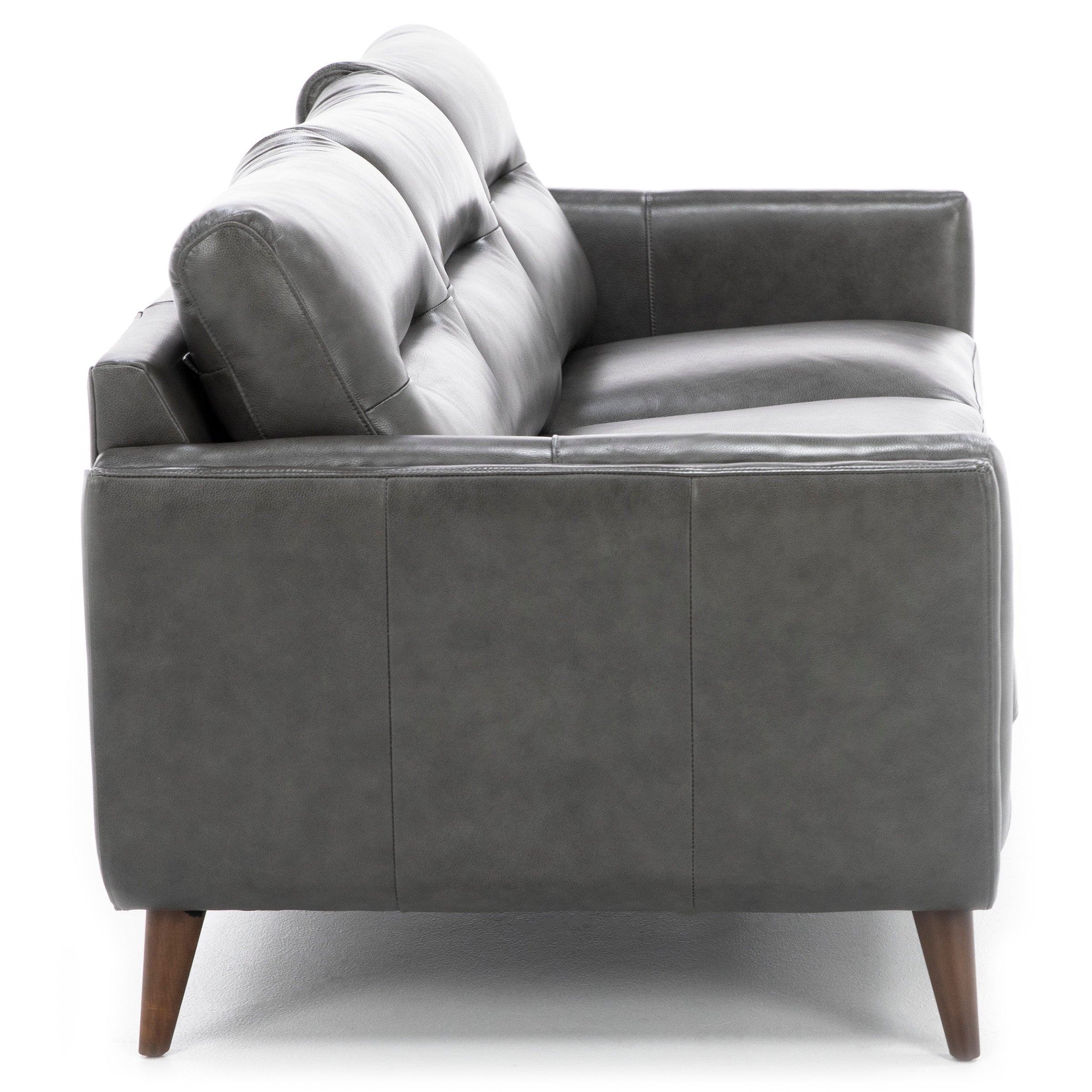 Side view of a modern dark gray leather sofa with wooden legs.