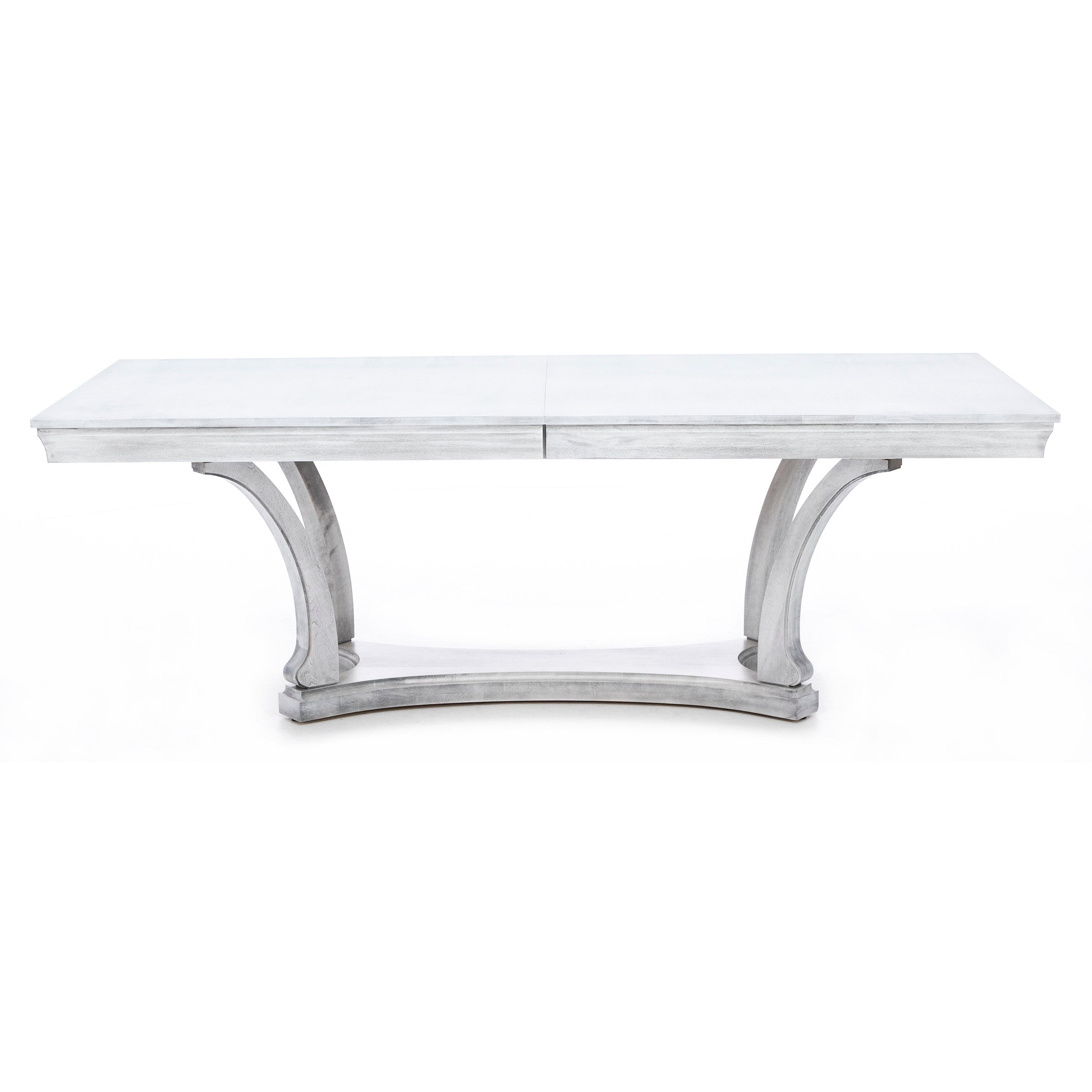 Rectangular dining table with a light grey wood finish and curved pedestal base.