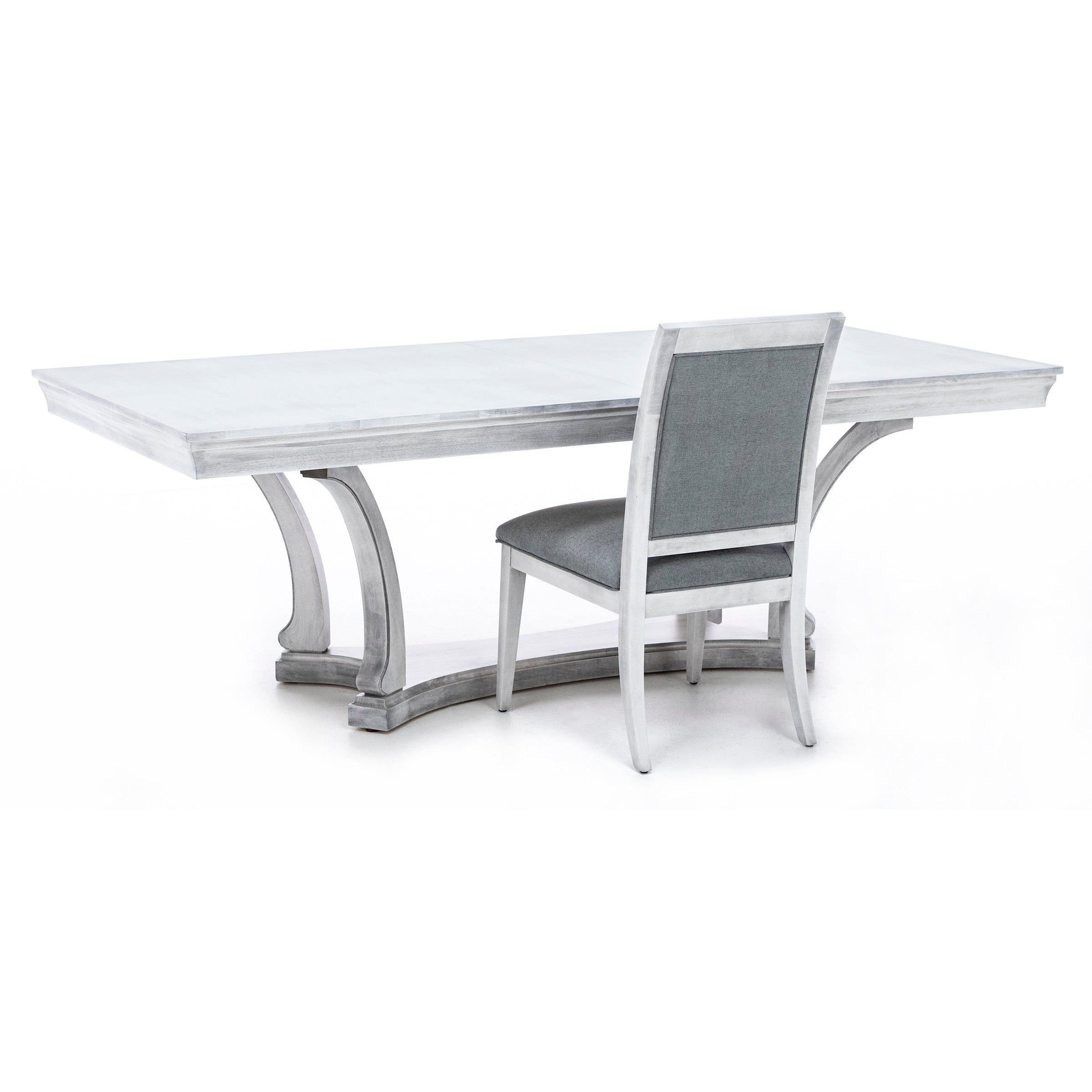 Light gray rectangular dining table with matching upholstered chair.