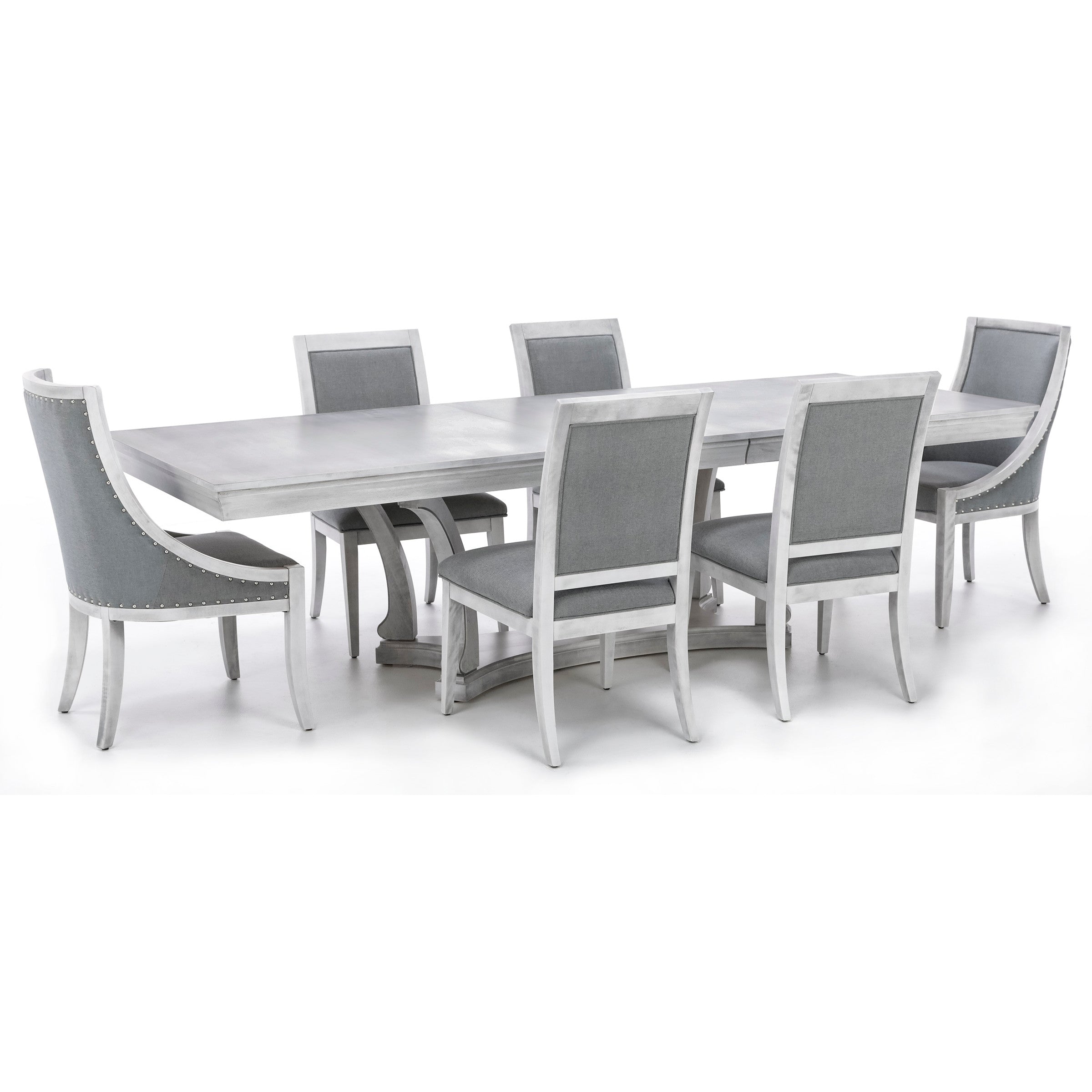 Rectangular dining table with six gray upholstered chairs.