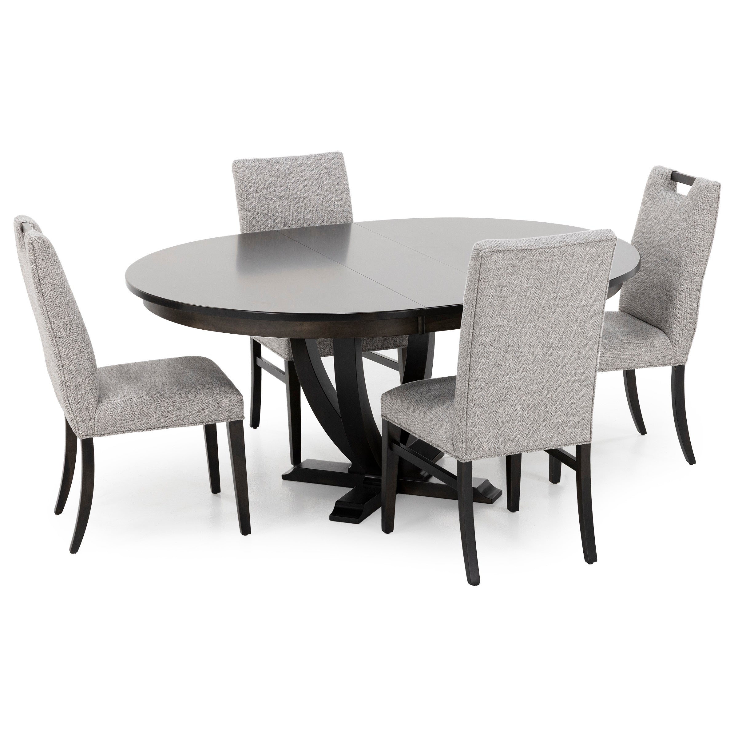 Dark wood oval dining table with four upholstered gray chairs.