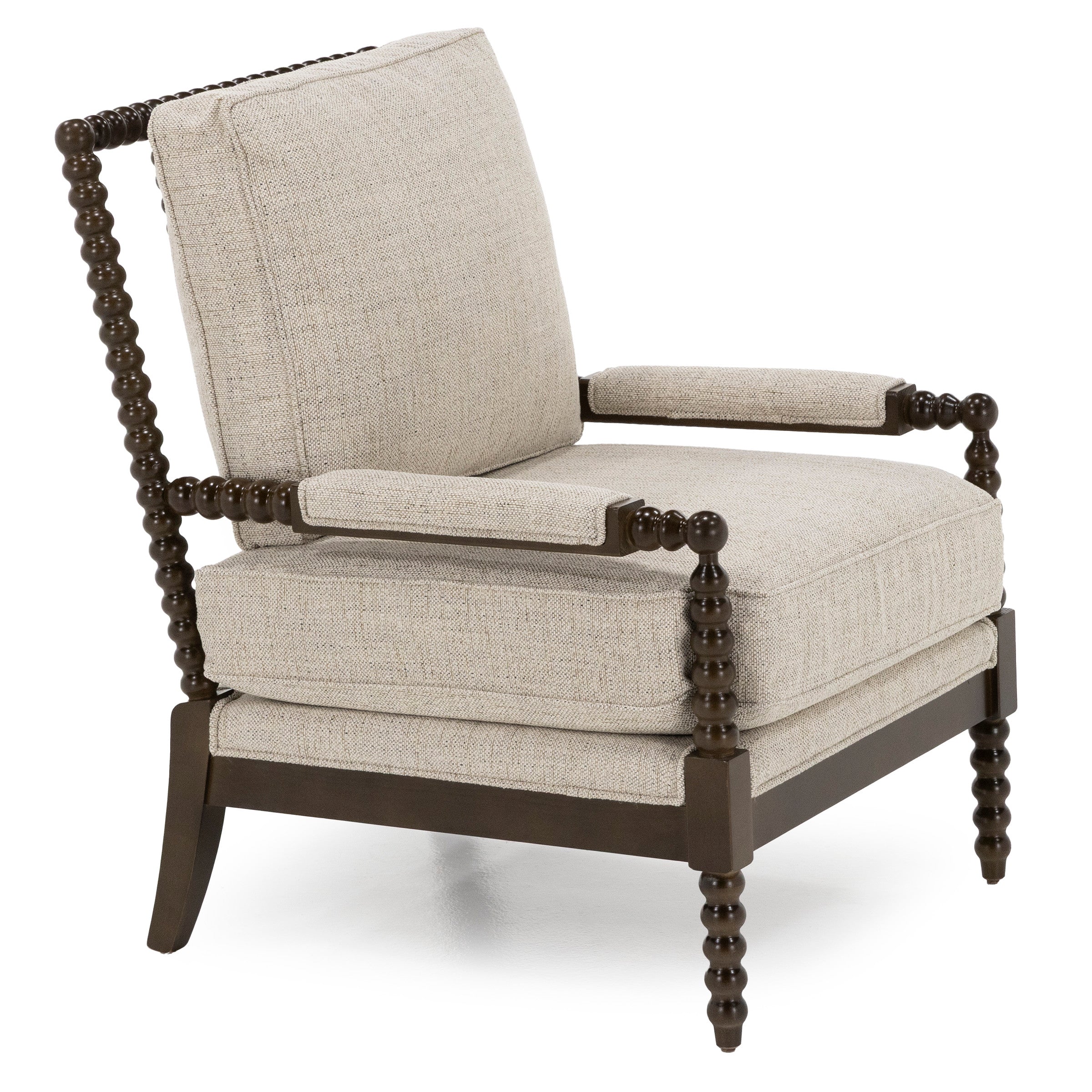 Upholstered accent chair with light beige fabric and dark wood spindle frame.