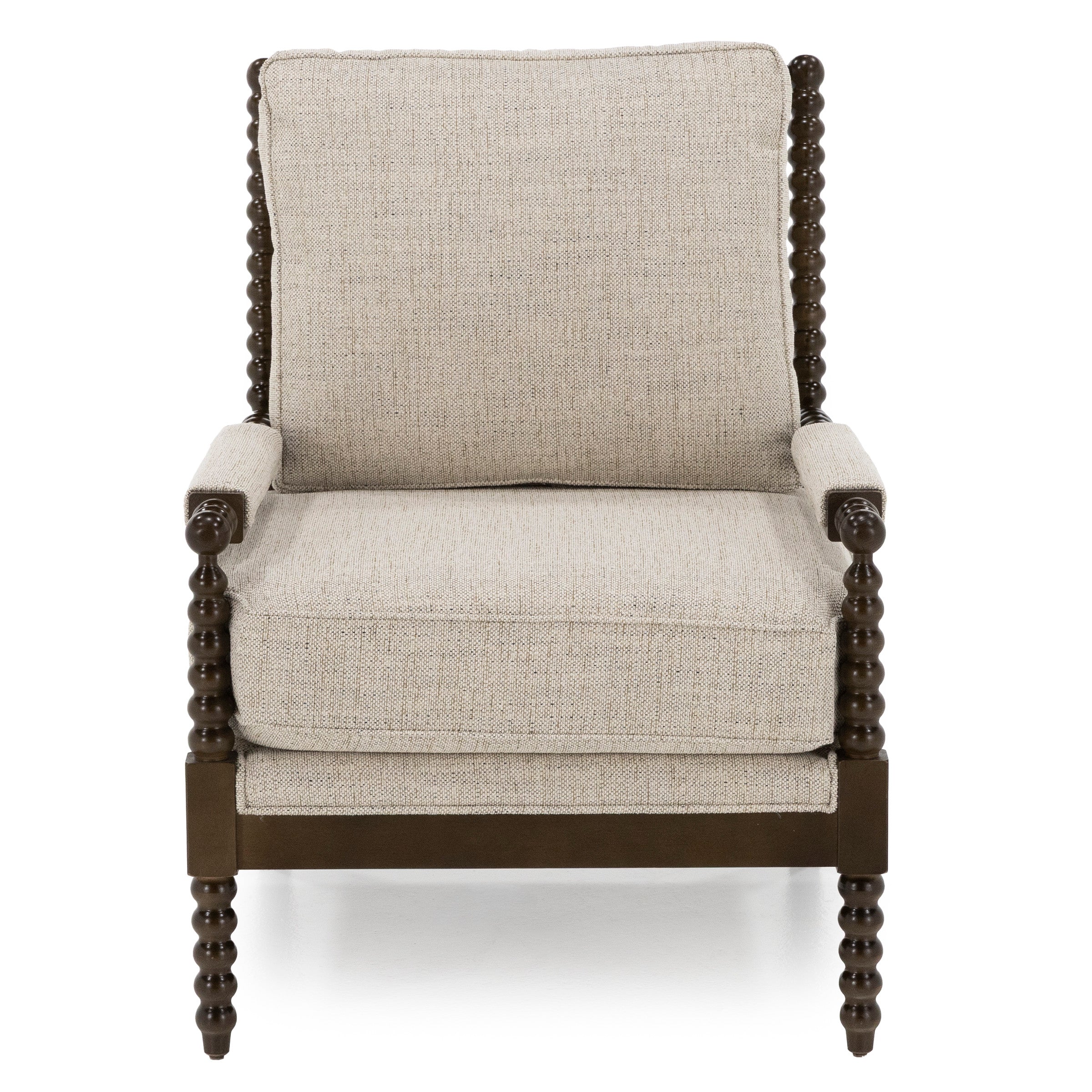 Beige upholstered accent chair with dark wood spindle frame, shown from the front.