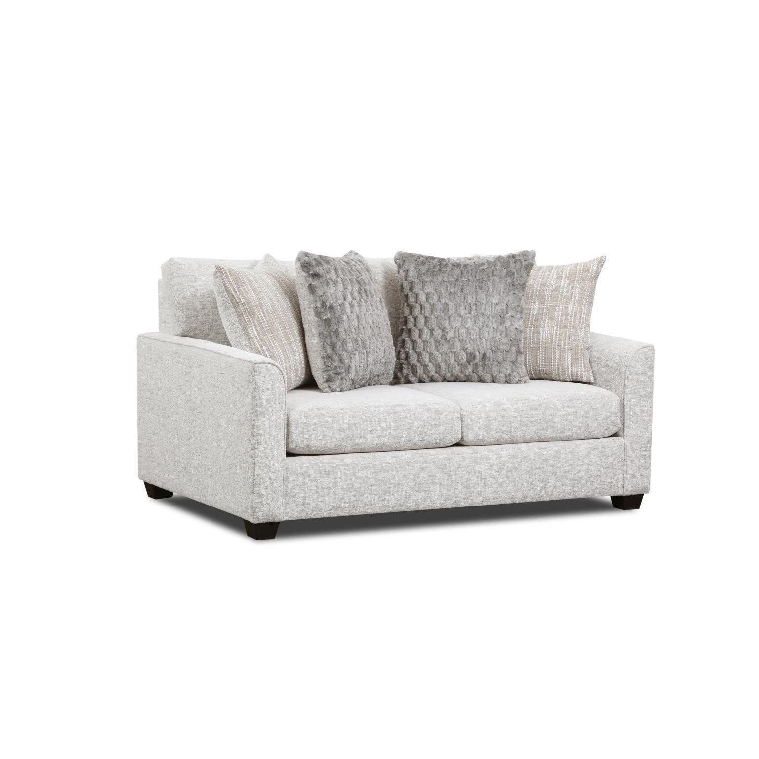Light gray upholstered sofa with four accent pillows.