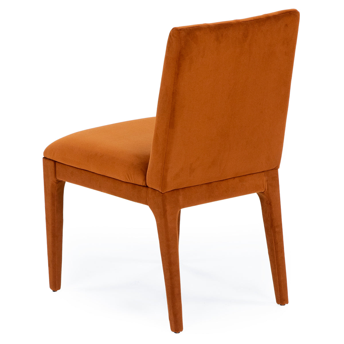Modern burnt orange upholstered side chair with straight legs, shown from back angle.