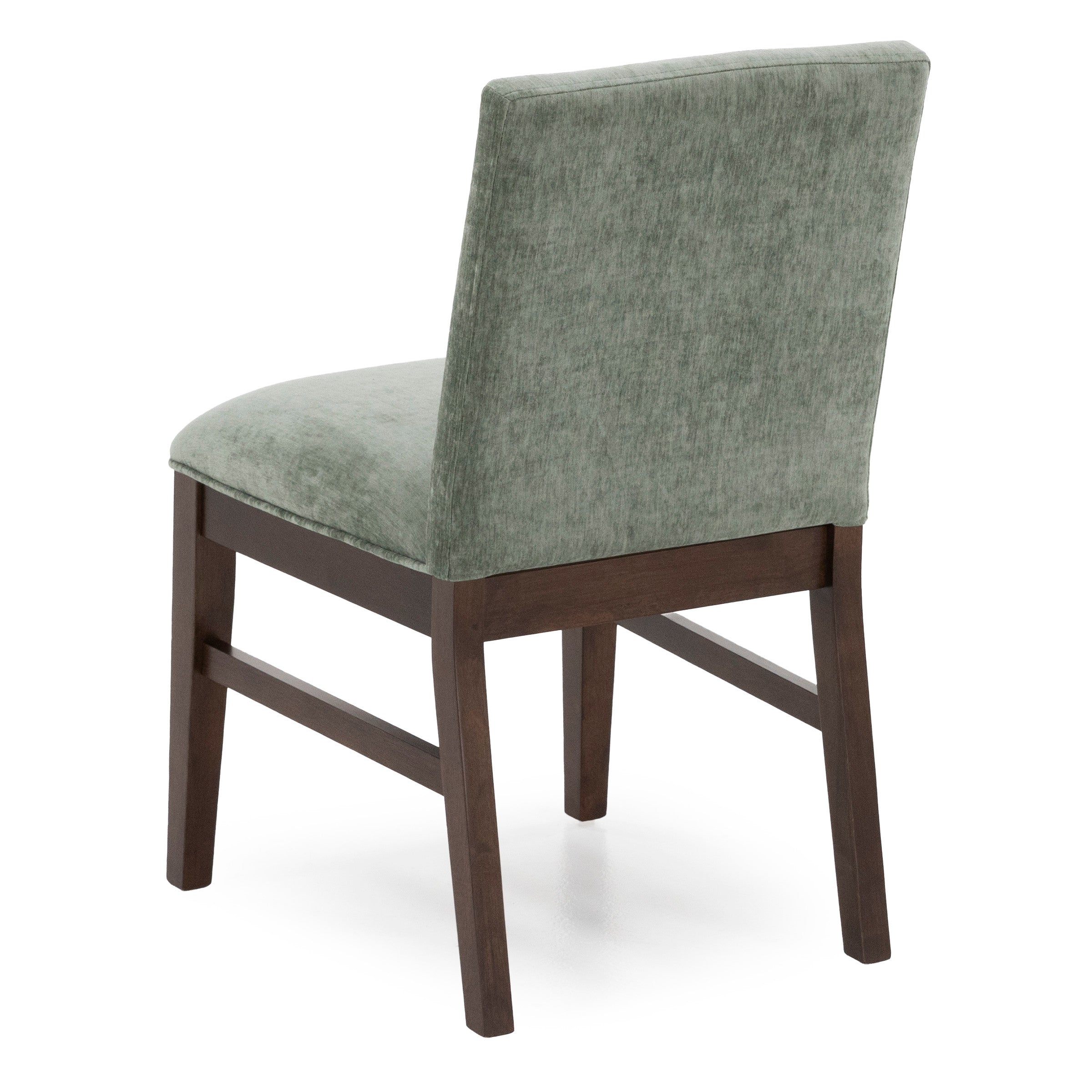 Upholstered dining chair with green fabric and dark wood legs.