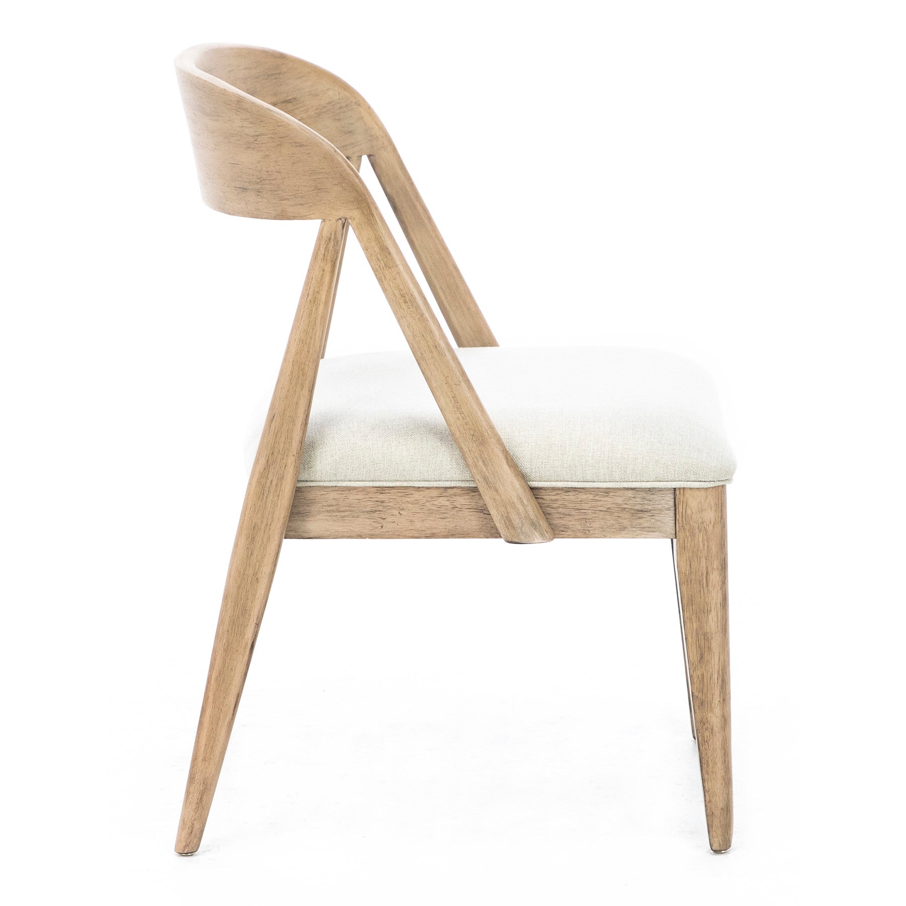Side view of a modern wooden chair with a curved backrest and light upholstered seat.