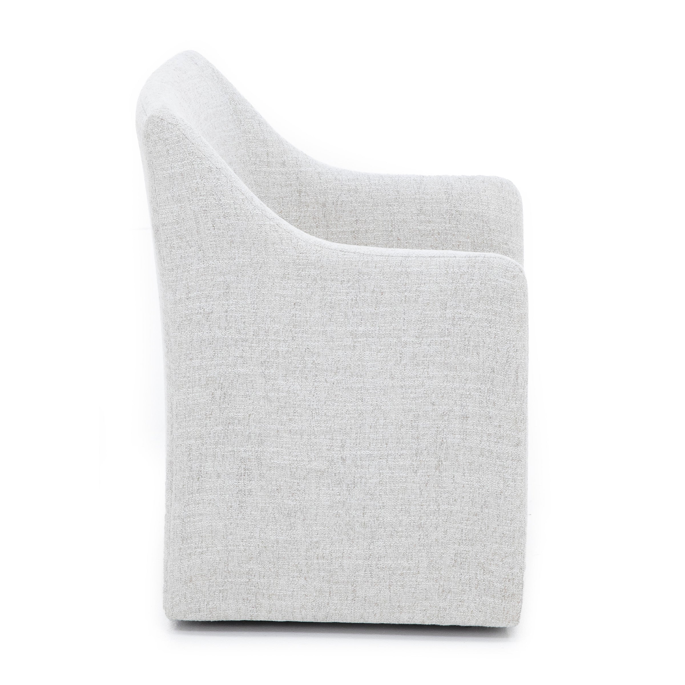 Side view of a modern light gray upholstered armchair with curved arms.