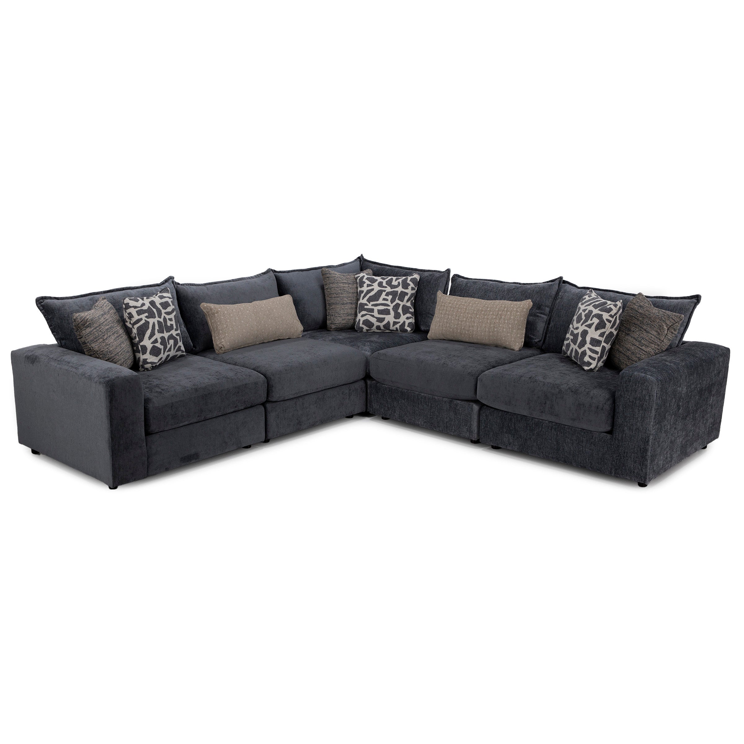 Dark gray L-shaped sectional sofa with assorted patterned and solid throw pillows.