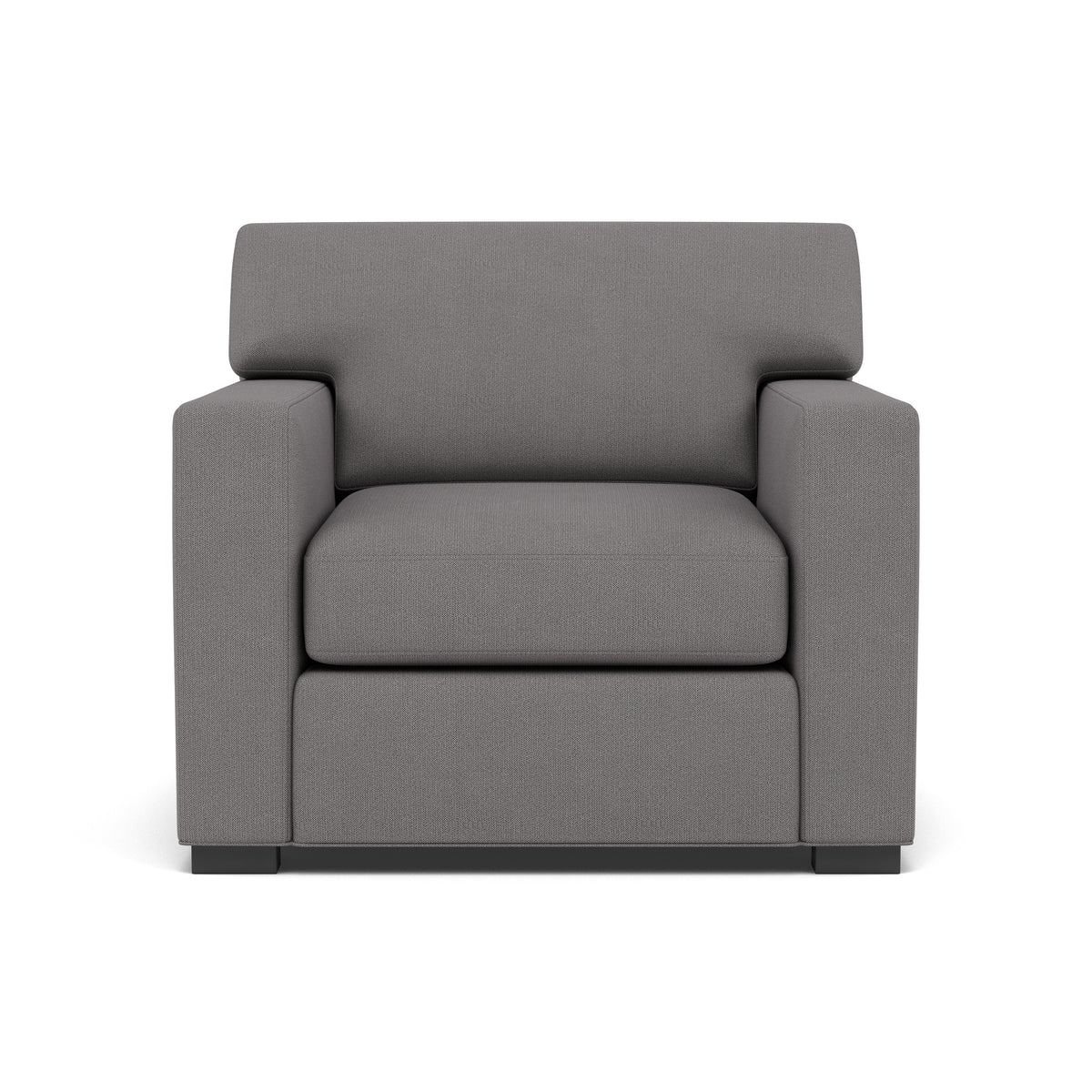 Modern gray armchair with wide arms and a boxy, minimalist design.